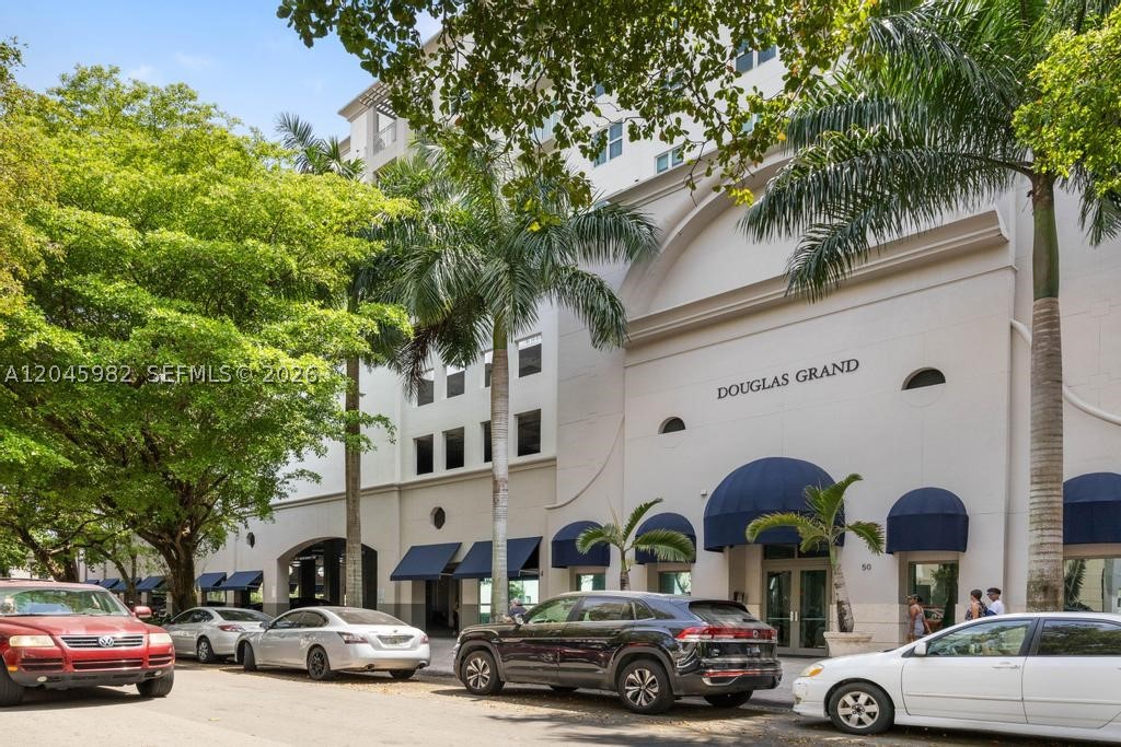 Live in the heart of Coral Gables in this bright top floor apartment, offering the perfect blend of comfort and convenience. This spacious one bedroom, one bathroom residence is filled with natural light, creating a warm and inviting atmosphere throughout the day. The open concept kitchen features a breakfast area, making it ideal for both everyday living and entertaining. The generous sized bedroom includes a closet, and the in-unit washer and dryer provide added convenience. the unit comes with one assigned covered parking space. Residents enjoy amenities, including a swimming pool, fitness center, secured entry, and concierge service. Ideally located with Publix conveniently situated in the building and the shops, restaurants, and entertainment of Downtown Coral Gables just steps away.