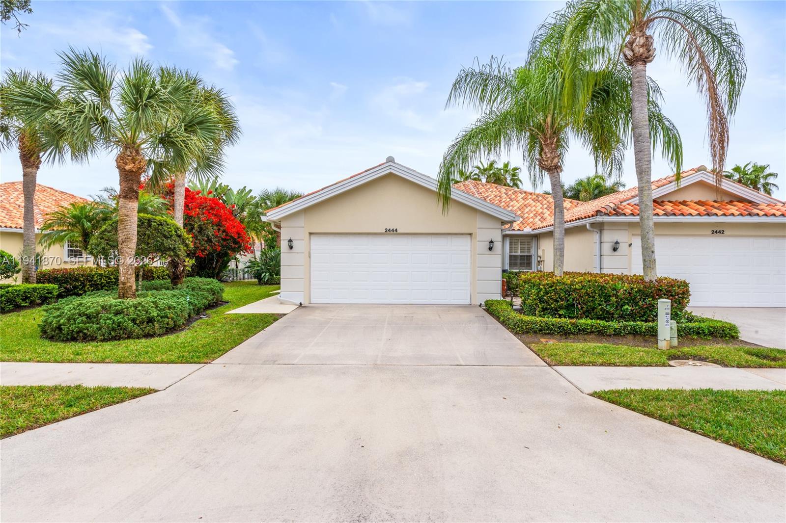 Move-in ready and thoughtfully updated, this single-story Capri III patio home offers low-maintenance living in one of Palm City’s most desirable communities. Major improvements have already been completed, including a 2022 roof, BRAND NEW AC (includes 10 year parts warranty), remodeled kitchen with quartz countertops and new cabinetry, and porcelain tile flooring throughout, giving buyers peace of mind and immediate enjoyment. Designed for easy everyday living, the split floor plan features 2 bedrooms, 2 bathrooms, and a spacious great room filled with natural light. The home seamlessly extends outdoors through a brand-new impact glass sliding door to an expanded screened lanai, overlooking a private, fully fenced backyard—perfect for relaxing, entertaining, or pets. Additional highlights include a 2-car garage, central vacuum, and ample storage. The HOA covers lawn care, cable, and internet, making this an ideal option for full-time residents or seasonal owners seeking a lock-and-leave lifestyle. Conveniently located near top-rated schools, shopping, dining, and major commuter routes, this home offers a rare opportunity to enjoy updated, easy living in the heart of Palm City.