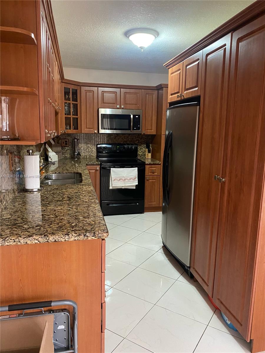 MILLER GARDENS CONDO - Residential Lease