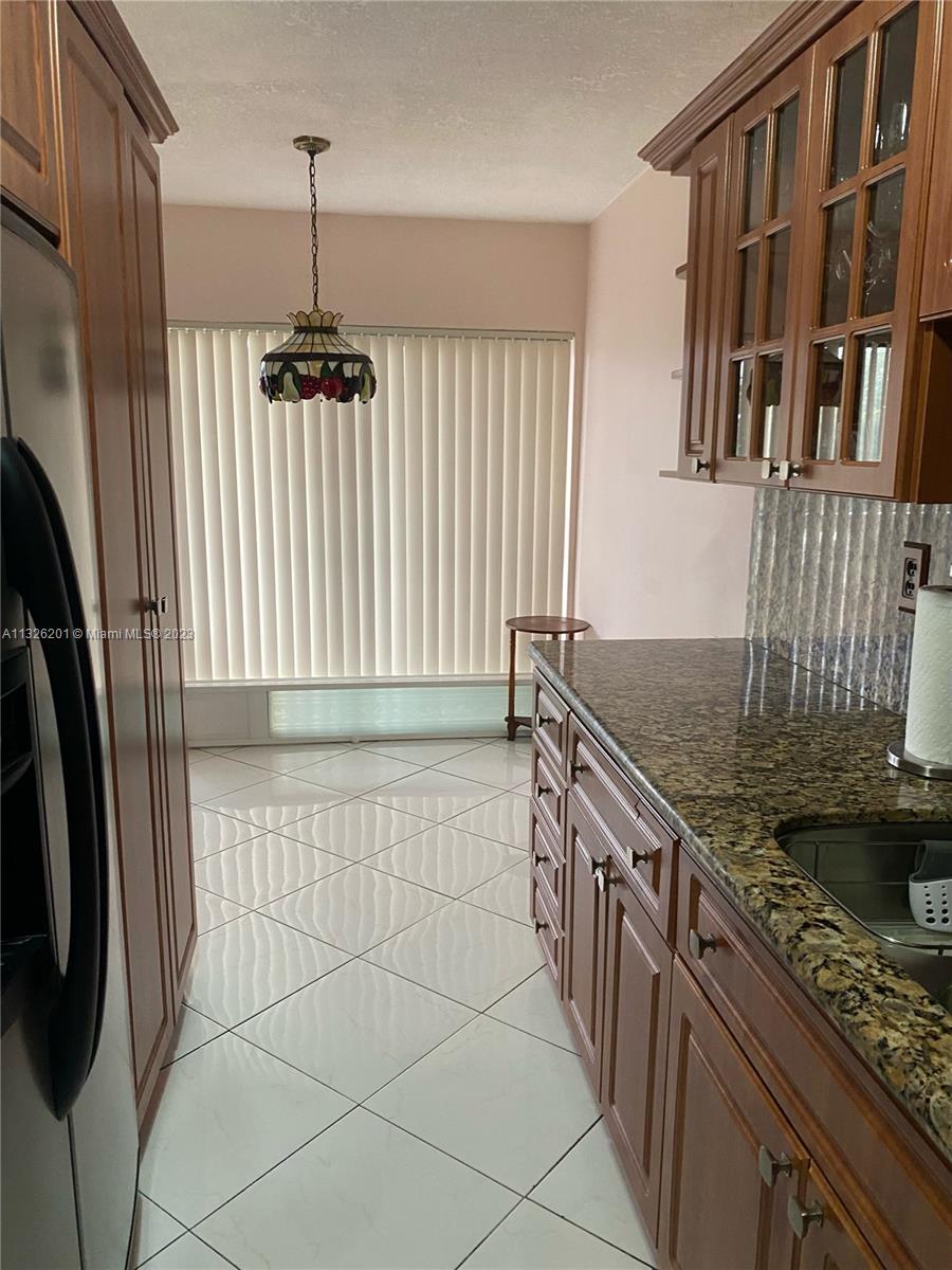 MILLER GARDENS CONDO - Residential Lease