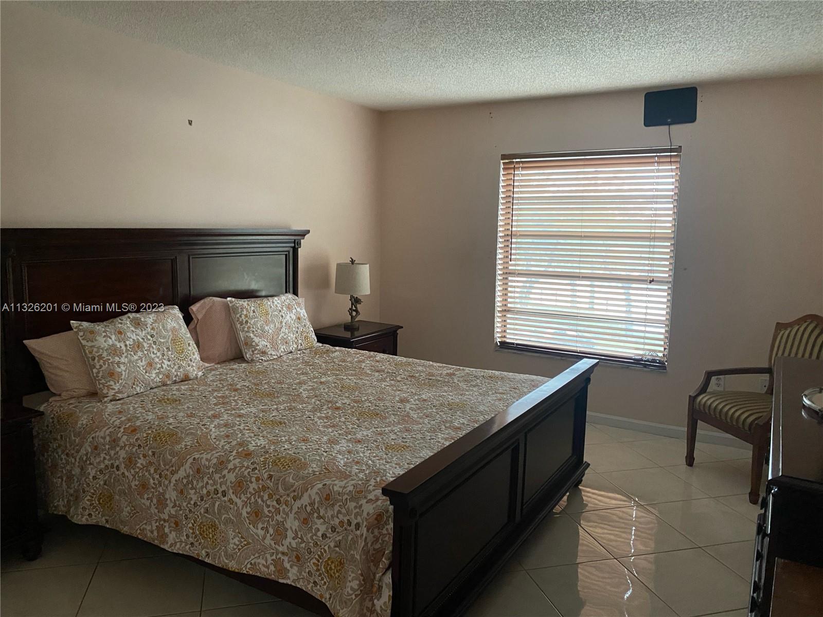 MILLER GARDENS CONDO - Residential Lease