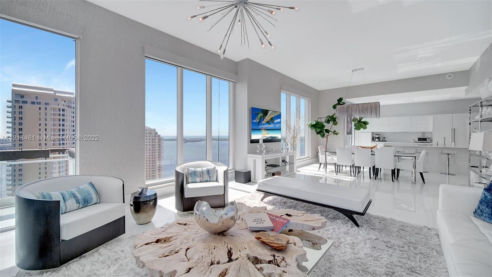 Beautifully decorated apartment located in the exclusive Brickell Key Island! Corner unit with breathtaking views of the ocean, Biscayne Bay, and Miami's skyline. 12-foot ceilings and incredible water views from each of its four bedrooms. The home features a private elevator, 4 bedrooms, 5.5 bathrooms, a maid's quarters, TV room, an assigned storage unit and 3 assigned parking spaces.  Furniture is included, except a few items, personal items and art. The buildings amenities include a 24/7 valet and concierge, tennis & basketball/racquetball court, swimming pool, jacuzzi, gym & party room. Note: Building is under renovation on the outdoor areas. PLEASE SEE BROKER REMARKS FOR SHOWING INSTRUCTION.