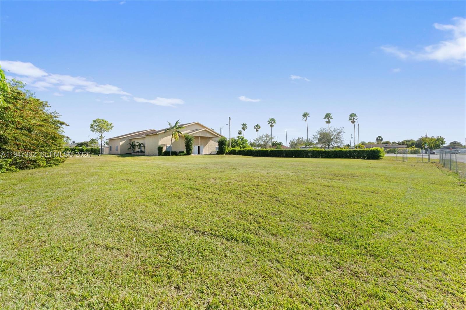 Prime South Dade Development Opportunity with Live Local Upside!
Rare opportunity to acquire an under-constructed ±6,800 SF structure on a combined 42,300 SF corner lot in Goulds. The property includes four folios (30-6007-001-0220, 0230, 0260, 0270) joined by a Unity of Title, offering flexibility for redevelopment or adaptive reuse. The unfinished place of worship requires completion and issuance of a Certificate of Use (CU). Upon obtaining the CU, a buyer may pursue redevelopment under Florida’s Live Local Act (SB 1730), subject to county approval, including potential 200-unit multifamily development with affordable housing incentives. Faith-based organizations may complete the structure for worship use with future expansion into a school or faith-based affordable housing campus. Alternatively, a buyer may seek a Unity of Title release and develop single-family homes, as zoned RU-1. Ideally located at the corner of SW 216 St & SW 110 Ave, the site offers strong visibility, traffic exposure, and proximity to the new South Dade Transit Busway (3 minutes). The property is also just 4 minutes from the $1.5B Southplace City Center redevelopment at Southland Mall, positioning it for long-term growth. Well-suited for developers, religious organizations, educational institutions or investors seeking long term growth.