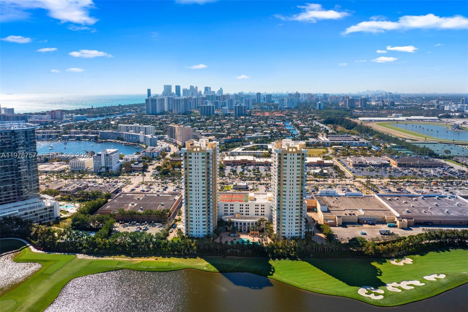 Rarely available super cozy high-floor 1-bedroom with 1.5 baths and spectacular golf course, pool & ocean views! Spacious, well-designed floor plan with open kitchen and balcony, perfect for relaxing or entertaining. Desirable layout offers direct balcony access from the bedroom — a feature not available in the other 1-bedroom model — bringing in additional natural light and an airy open feel.

Apt. features impact windows, granite countertops, SS appliances, WASHER/DRYER, and a huge private storage room (see photo).

Duo Condo offers resort-style amenities: 24-hr security, valet parking, business center, theatre room, tennis courts, spa & fitness center, jogging path, billiard room & party room.

Prime location! Walk to the beach, Starbucks, Panera Bread, and fine & casual dining. Gulfstream Park & Aventura Mall just 10 minutes away.

Maintenance includes cable/internet, water, sewer, trash, appliance contract & more. See broker remarks.
