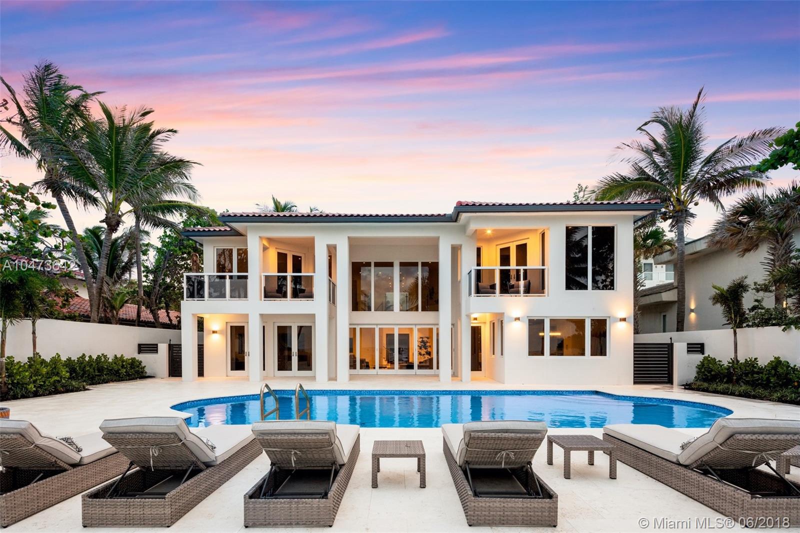 Exquisite beachfront property located in the prestigious private neighborhood of Golden Beach offering unparalleled ocean front living. This rare gem boasts 7,159 sq ft of spacious living area, 24,900 Sq ft lot with 75 feet of sandy beach. 7 Bedrooms and 8.5 Bathrooms. Fully renovated, turn key. Natural lighting encompasses home throughout. Massive chefs kitchen and open contemporary floor plan. Paradise in your own backyard.
