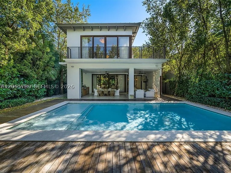 Experience luxury living at its finest in this modern two-story oasis in the desirable Coconut Grove, boastingsoaring high ceilings, 5 spacious bedrooms, 5 full baths, and 2 half baths with elegant marble floors throughout.The smart home system features Google integration, smart thermostats on both levels, and brand-new electricblackout shades on the second floor. The chef’s kitchen is upgraded with a stunning marble countertop and a newisland, complemented by breathtaking living and dining spaces. Enjoy the heated saltwater pool and entertain inthe stunning backyard oasis, featuring a built-in grill. An advanced alarm system secures both the interior andexterior, with multiple cameras and a smart electric gate. This spectacular home offers comfort, security, andeffortless style in Miami’s coveted Coconut Grove. Ideally located near Biscayne Bay, top schools, fine dining, andparks, this property delivers the ultimate South Florida lifestyle.