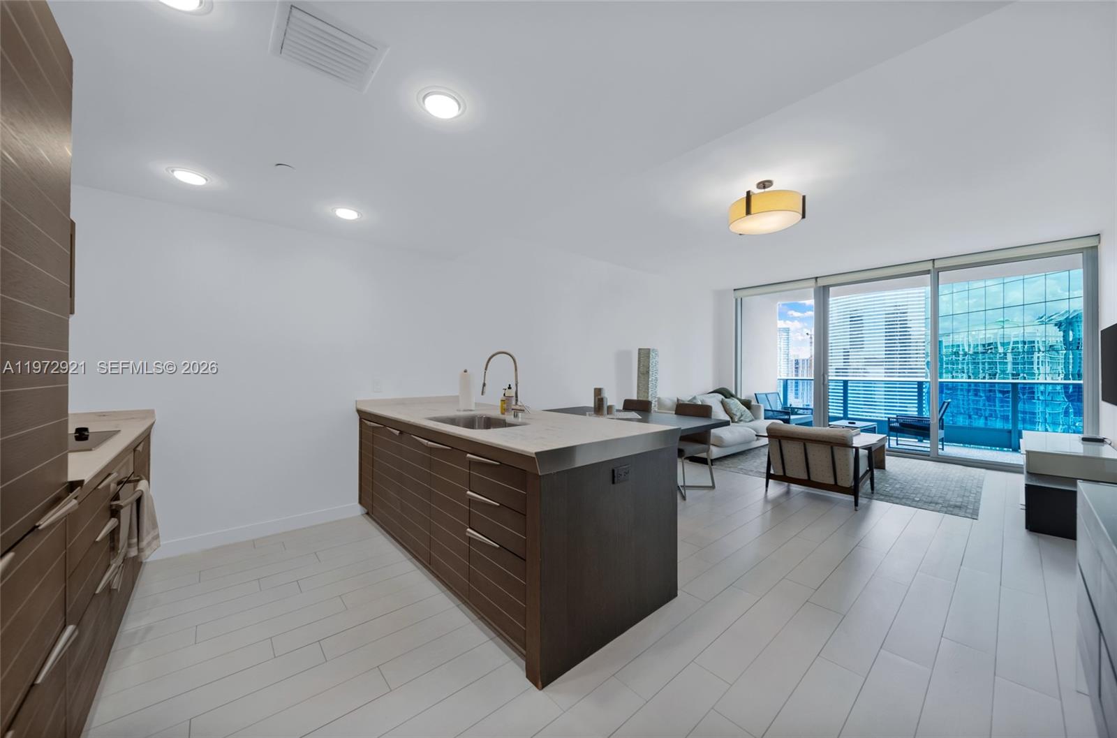 Beautiful 1 bed 1.5 Baths condo at Epic Residences in Downtown/Brickell. Snaidero Kitchen Cabinets, Miele, Subzero and Bosch Appliances; Custom closets, washer and dryer, an oversized jacuzzi tub, dual sinks. River and City Views, floor to ceiling windows. Includes 1 assigned parking and 1 assigned storage cage. Residents have access to Joia Beach Club, dining discounts at select restaurants, complimentary Silverspot Cinema tickets. Great location, walking distance to Whole Foods, Brickell City Center, and many restaurants. No current Special Assessment. SIRS structural integrity reserve study is complete. Full Reserves.