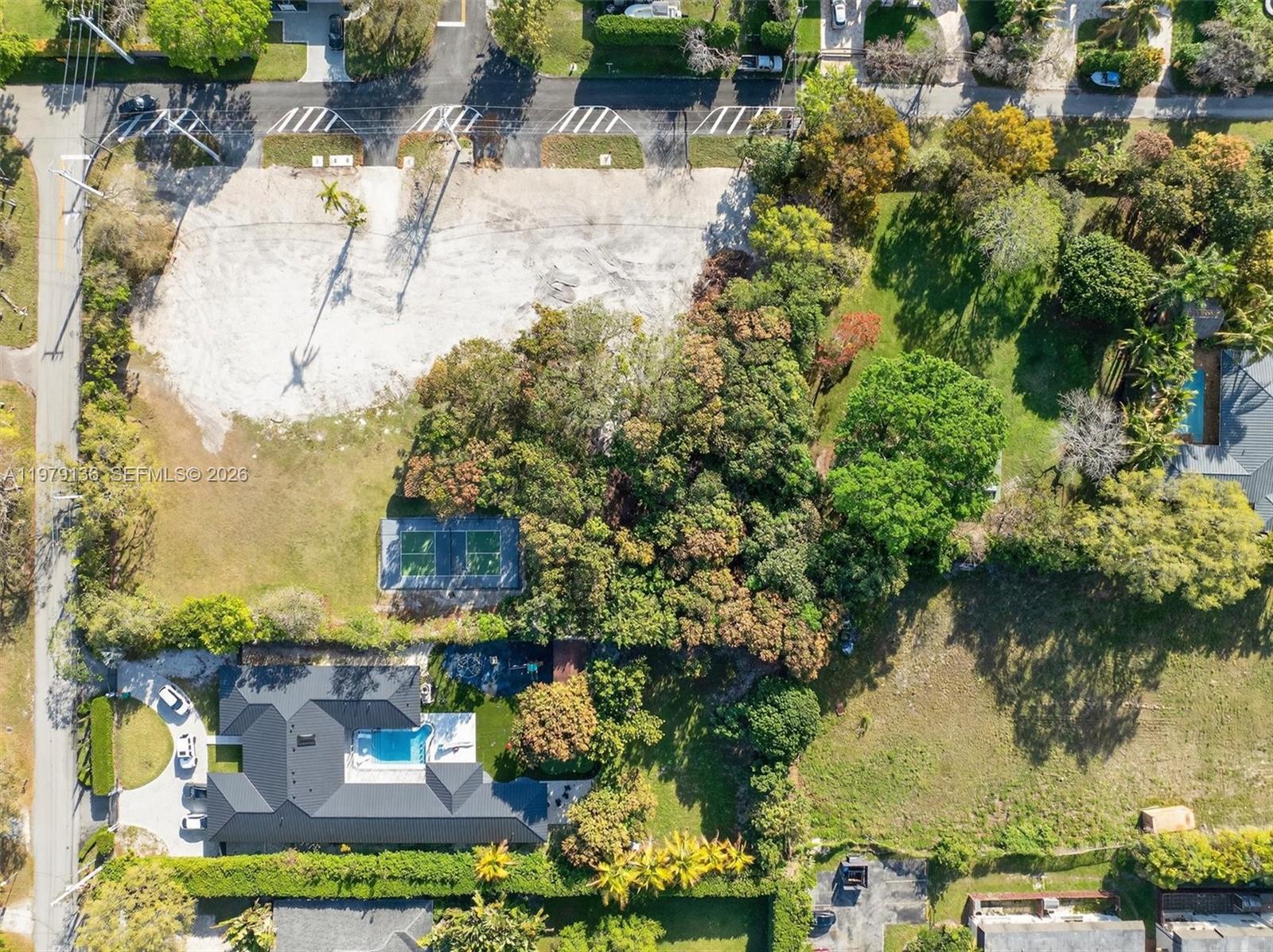 Exceptional 1.44-Acre (62,850 SF) development opportunity in Continental Park. Rare chance to acquire strategically located land in one of Miami’s most established and desirable neighborhoods. The property is currently under application for a proposed 79 unit residential development with 81 parking spaces and benefits from RM-D zoning (36 units per acre), Workforce Housing provisions, Smart Corridor Plan incentives, and Administrative Site Plan Review. Existing water and sewer infrastructure is in place, creating significant development efficiencies. The approval process is anticipated to be streamlined, with no public hearing currently required, while deletion of the existing declaration is underway. Ideally positioned just two blocks from Baptist Hospital’s Main Campus, one of South Florida’s largest healthcare and employment centers, the site is well-suited for workforce, multifamily, and attainable housing. Residents enjoy immediate access to US-1, SR-878, Florida’s Turnpike, and SR-826, plus proximity to Dadeland, Coral Gables, Pinecrest, Coconut Grove, and Downtown Miami. Located within a mature residential setting known for oversized homesites and long-term desirability, this offering presents a compelling investors, and joint venture groups seeking to capitalize on Miami-Dade County’s growing housing demand. Development sites combining location, infrastructure readiness, entitlement potential, and access to major employment hubs are increasingly scarce.