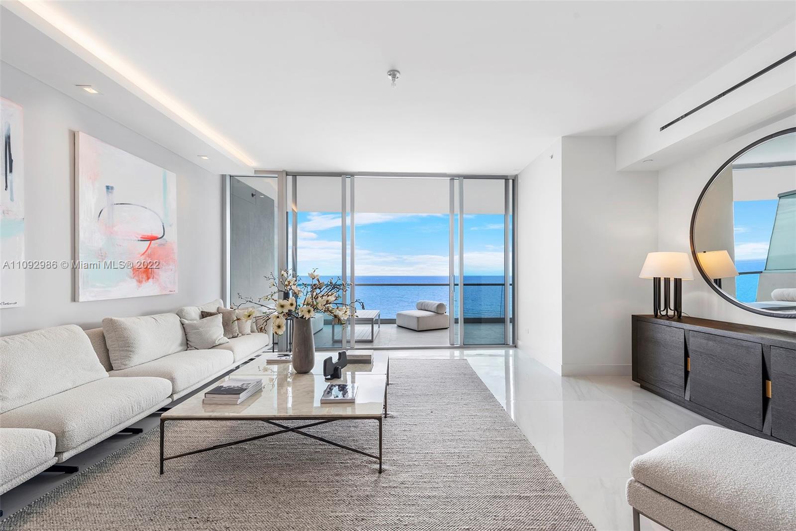 NOW FINISHED AND FURNISHED! Updated photos coming soon. Italian porcelain flooring throughout and custom closets, Residence 2003 offers move-in ready convenience at Turnberry's newest oceanfront ultra-luxury tower. A spacious 3-Bedroom/4.5 Bathroom flowthrough floor plan, #2003 offers breathtaking ocean & bay views from your east & west terraces. Exceptional finishes include Italian marble bathrooms with steam shower, Snaidero kitchen cabinetry and Gaggenau appliances. Your private elevator foyer takes you directly to any of the SIX floors of family-friendly amenities, including: 3 Swimming pools, private dining restaurants, spa, hair & nail salon, fitness center, dog park, kids’ room, theater and more. The new owner of Residence 2003 will pay NO Developer Fees at Closing.