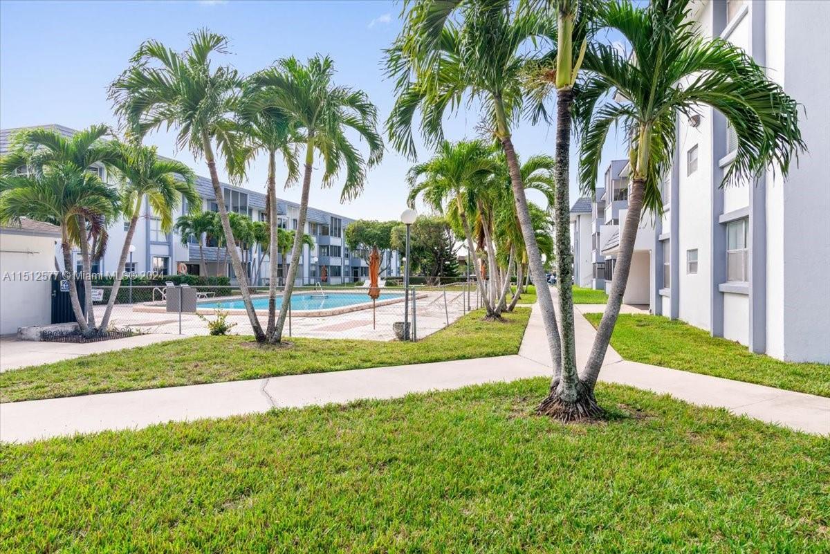 Amazing & Remodeled 3 bedrooms and 2 full baths unit. Don't miss out on this incredible opportunity at Ludlum Lake condo. Conveniently located on the 1st floor with a private open balcony. With almost 1100 sqft of space, it boasts ample closet space, including a walk-in closet in the master bedroom, and a master bath with a shower. The living/dining room is spacious, and the kitchen has been completely remodeled with brand new stainless steell appliances. Newer A/C system,  porcelain floors throughout, and 2 parking spaces. Gated parking with additional guest parking. The property has low maintenance fees and taxes. New Roof. It's conveniently located steps away from the Palmetto Expressway (826) and I-75, and just minutes from the Miami Lakes business district.