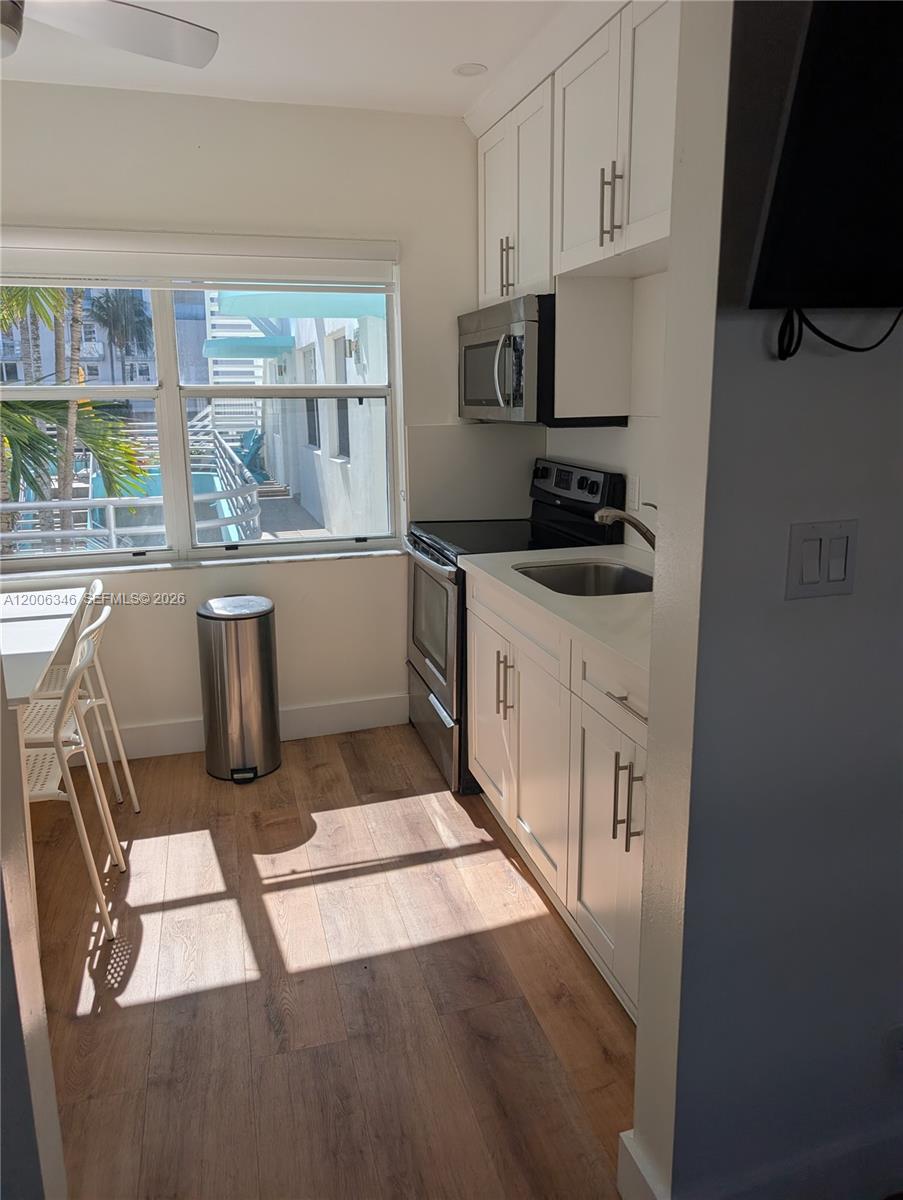 Rare opportunity to own a furnished beachfront unit with strong rental income potential. Ideally located directly on Hollywood Beach and its iconic Broadwalk, this updated residence places you steps from a vibrant selection of dining options.
Inside, the unit features a stylishly renovated kitchen with white countertops and original wood flooring throughout. Enjoy convenient access to popular destinations like Dania Pointe, Aventura Mall, and Fort Lauderdale-Hollywood International Airport. The location is a proven favorite for vacationers thanks to its direct access to the Broadwalk’s vibrant restaurants, cafés, nightlife, boutique shops, and, of course, the stunning sandy beaches just steps away. 
Including a private parking lot with a parking space. A flexible rental policy makes this property especially attractive for seasonal use or investment.  Whether you’re looking for a smart investment, a vacation getaway, or both, this is an incredible opportunity in one of South Florida’s most desirable beachfront destinations.