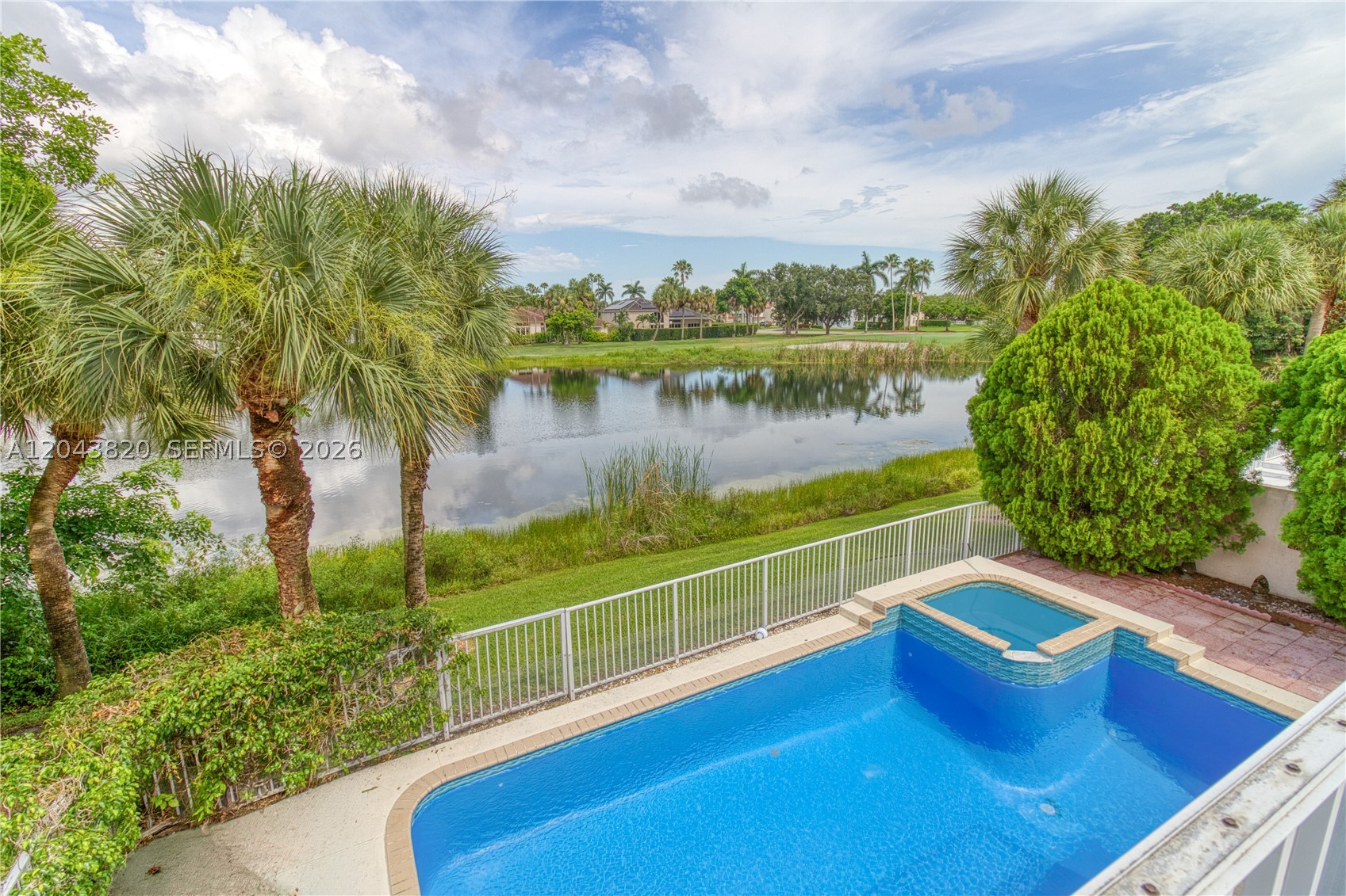 RARELY available TRUE 5 BEDROOM/3 BATH Poinciana model, located in exclusive Grand Palms Golf + Country Club! With stunning views of LAKE +GOLF from Family, kitchen + bedrooms upstairs (inc. Primary). Picture spending relaxing Saturday afternoons in backyard w/ family + friends, barbequing and enjoying crystal blue POOL! Newly renovated kitchen w/white cabinets + quartz countertops. Large Living/Dining area w/foyer that can double as a "great room". Grand Prime Suite w/ THREE closets (inc. walk-in), tray ceiling, long patio + extensive lake views. Expansive Prime Bathroom w/roman tub, toilet room, and dual sinks. ACCORDION SHUTTERS throughout, FULL SIZE washer + dryer in laundry room, +2 car garage. Owner will accept 1 dog/cat under 20lbs. Renters ins. req. Close to 75 + Pembroke Gardens.
