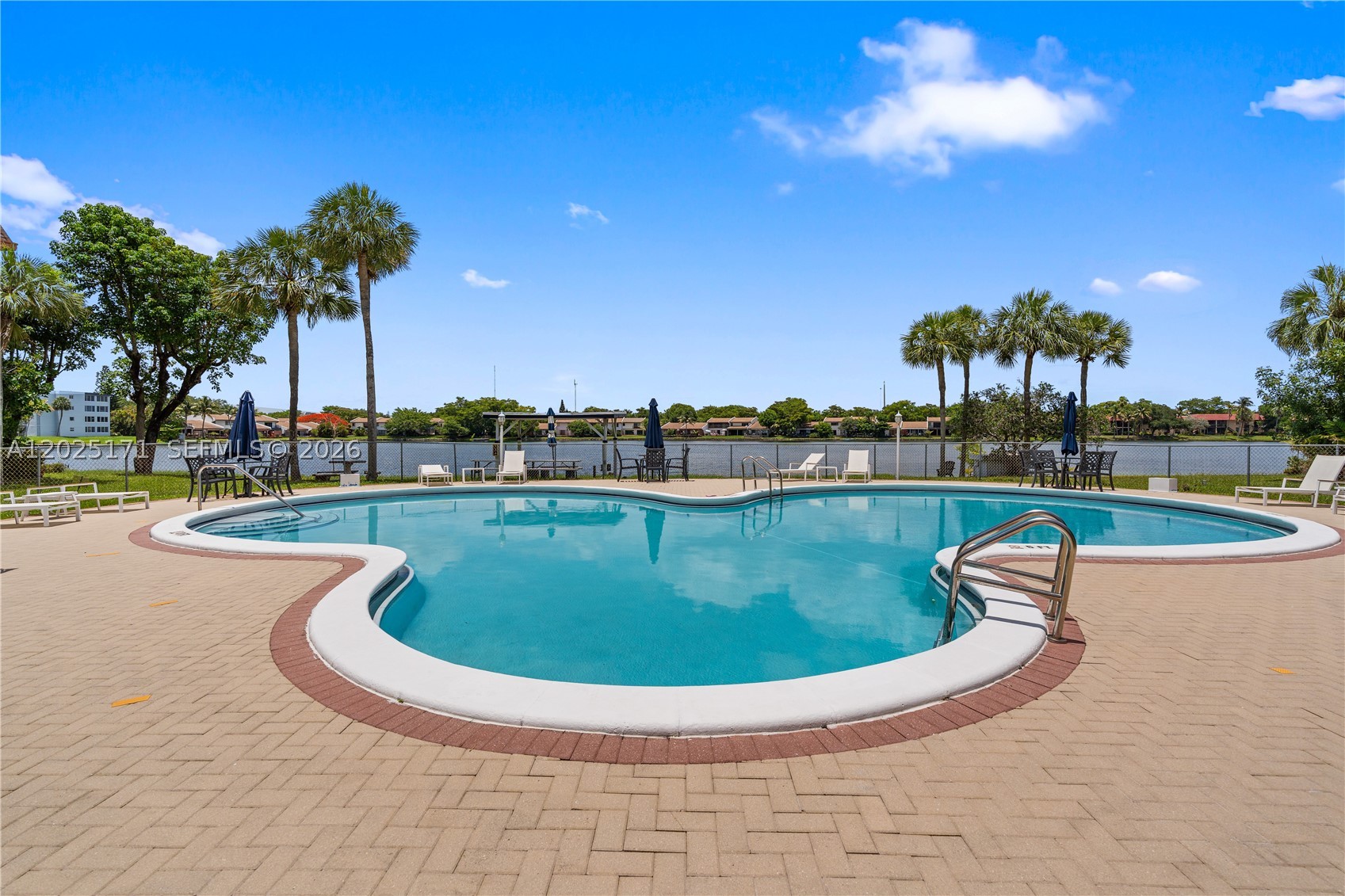 Introducing Cedar Glenn in an exceptional prime location in Miami just off I-95—between Downtown Miami & Fort Lauderdale, near Bright-line & Hard Rock Stadium. Fall in love with this spacious and updated 2-bedroom, 2-bathroom condo spanning 1,222 square feet,  located within a stylish low-rise building and offers a comfortable blend of functionality and simplicity.
Step inside to find a large living area featuring floor to ceilings windows with window treatments and tile floors throughout. The kitchen with quality wood cabinetry is spacious and features an island for breakfast or entertaining, while the granite-accented bathrooms offer a touch of luxury.
This building is perfectly equipped for relaxation and recreation, boasting a swimming pool, and an inviting green area in addition to Washer/Dryer facilities and a Gym. Enjoy the  common courtyard, garden, and outdoor spaces for a peaceful retreat.  This unit is exceptionally well maintained and features plenty of closet space a ready to move in. The building is secured with an intercom system for peace of mind.