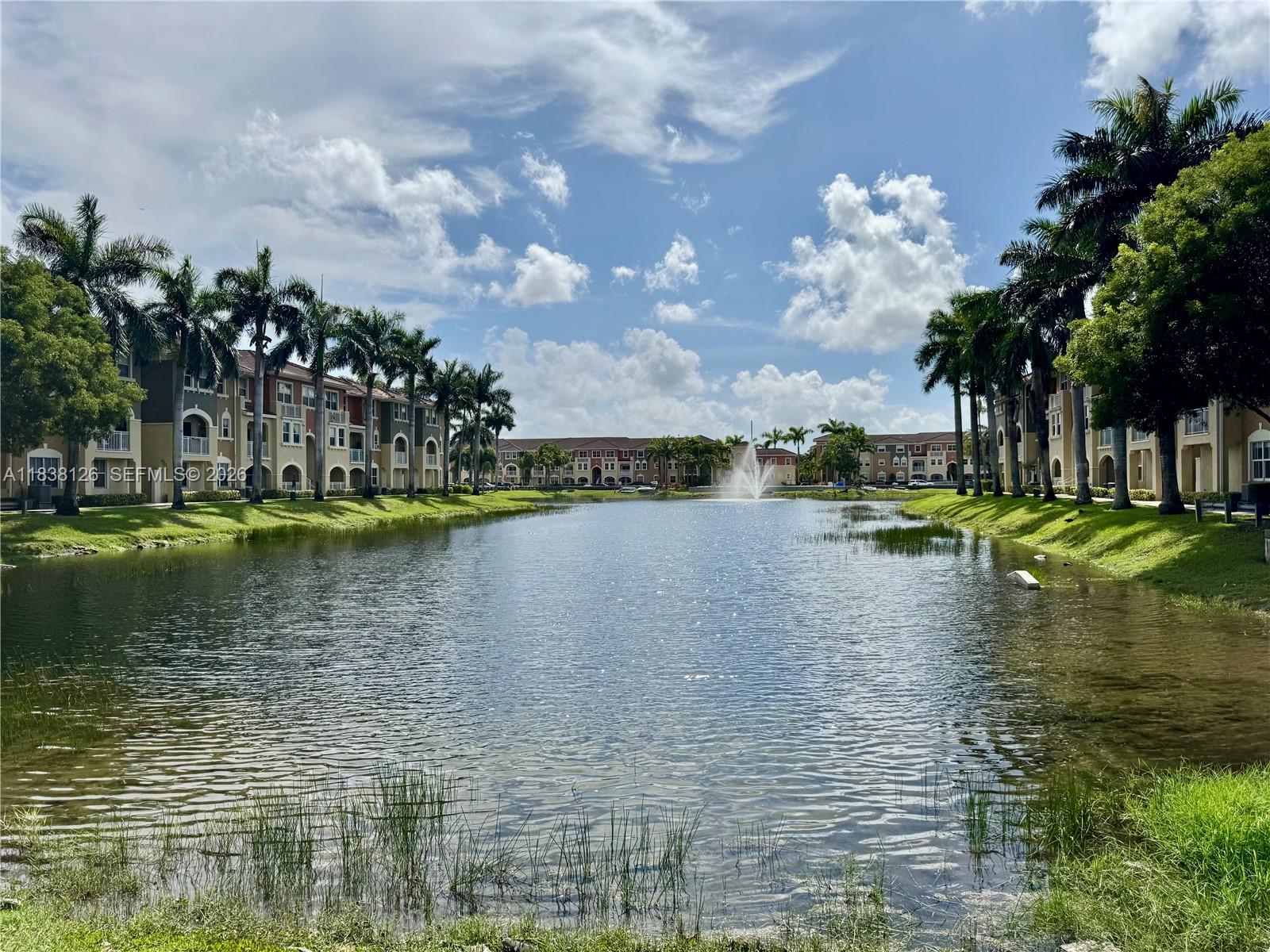 Great opportunity to own this amazing 2 Story condo 3 beds & 2 1/2 baths in the great and safe community of Coronado. Good condition. This property features Lake view, ceramic on first floor and carpet on second, kitchen with granite countertop, Stainless Steel Appliances, full size washer and dryer inside unit, Impact Windows and Door, security  patrol. Community clubhouse with Pool and gym. Firpta will be requiere atención the time of sale. This property is conveniently located near top-rated schools.
