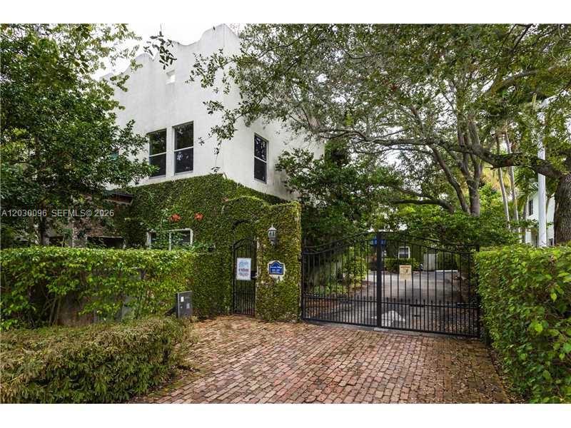 Discover the highly coveted 2-bedroom, 1.5-bath townhouse in Provence Village, nestled in the heart of Coconut Grove. This European-style community is known for its timeless charm, surrounded by lush natural vegetation that offers a serene living experience. The townhouse features classic Saltillo tile flooring in the living and kitchen areas, with elegant hardwood floors welcoming you in the foyer and continuing through the upstairs bedroom spaces. The modern white kitchen and bathrooms provide a clean, timeless design. Step outside to your private, brick-paved patio/garden, perfect for outdoor living and relaxation. The property includes the convenience of 2 assigned parking spaces. Don’t miss out on this rare opportunity to live in one of Coconut Grove’s most sought-after communities!