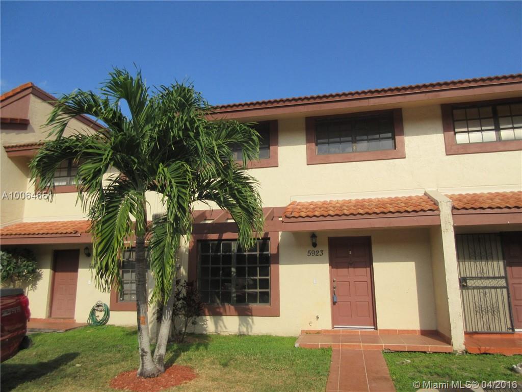 Rare find in Miller Dreams Townhouses!  Spacious 3/2.5 with two assigned parking spaces just in front of the unit.  Features newer flooring throughout, laundry room, living-dining combination, family room, eat-in kitchen and a rear private patio that has been tiled throughout as well creating the perfect setting for a BBQ family gathering. Show with confidence.  Unit is eligible for FHA and Convectional Financing! Easy to show – Call today!
