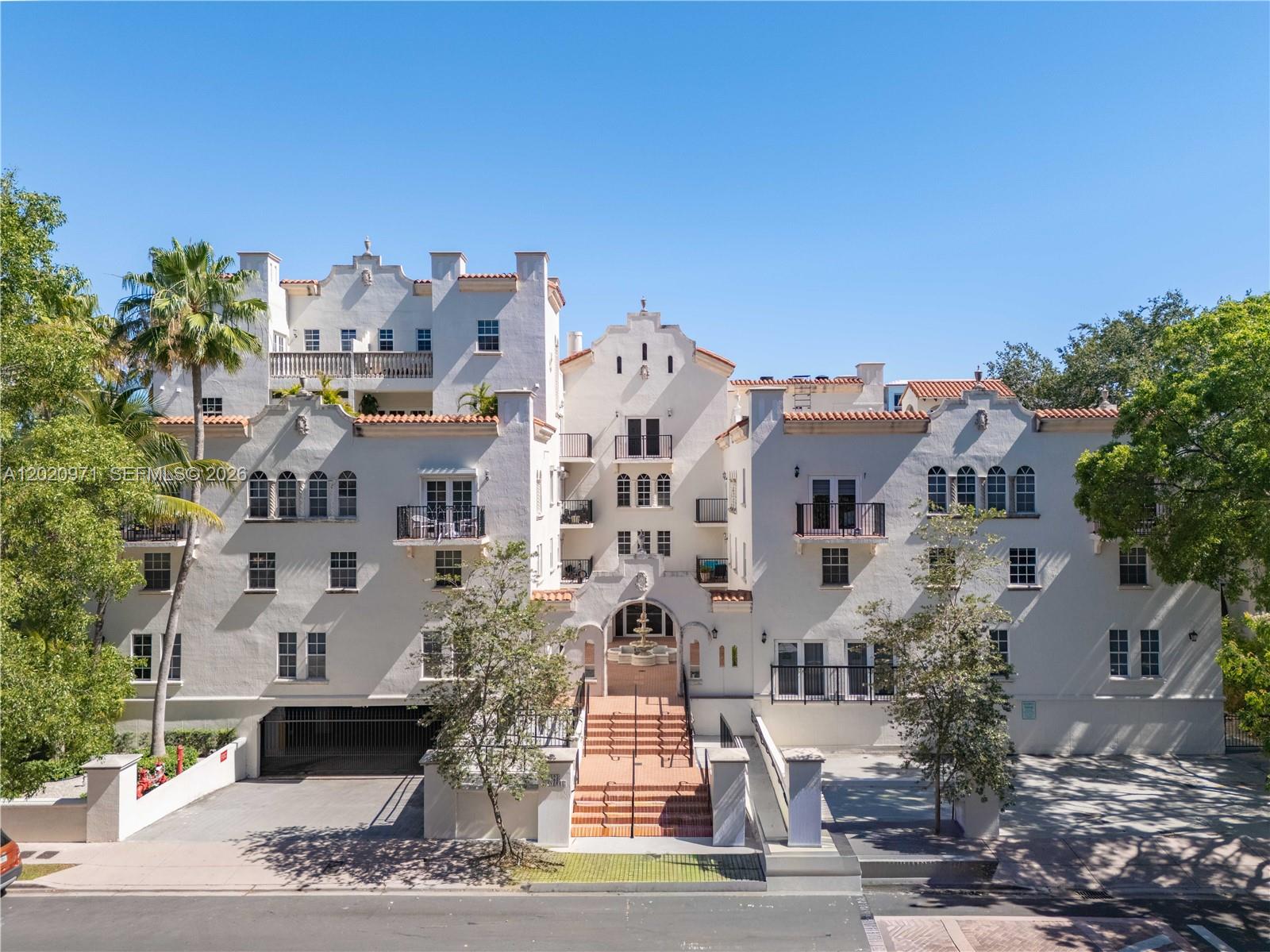 Poised atop an immaculate boutique building, walkable to Miracle Mile, this pristine 2-story corner PH offers the perfect blend of indoor-outdoor living. Featuring 2 bedrooms, 2 baths upstairs + a flex room (office/den or bedrm) & ½ bath downstairs - this bright condo is thoughtfully designed for comfortable living & effortless entertaining. The main level flows onto an expansive private terrace, creating the perfect setting for morning coffee, sunset cocktails, or intimate gatherings, all while enjoying breathtaking sunrise & sunset views. Upstairs, a large private sun deck provides an additional outdoor retreat ideal for lounging, yoga, entertaining, or soaking in the city skyline. Enjoy complete impact glass, 2023 A/C, new security cameras for peace of mind & 2 garage parking spaces.