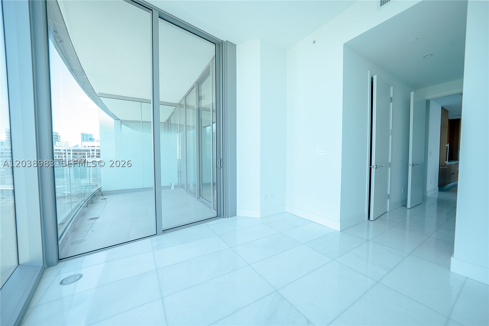 A brand-new 3-bedroom, 3.5-bath residence on the 27th floor of UNA, OKO Group's bayfront tower designed by Adrian Smith + Gordon Gill. Floor-to-ceiling glass frames views across Biscayne Bay and the Miami skyline, with oak wood flooring, clean contemporary lines, and a full Gaggenau kitchen throughout. Building amenities include three pools, a children's splash pad, a spa, fitness center, and private resident lounges — set directly on the bay, minutes from Brickell, Downtown Miami, Coconut Grove, Coral Gables, Key Biscayne, and major highways.
Be the first to live in it.