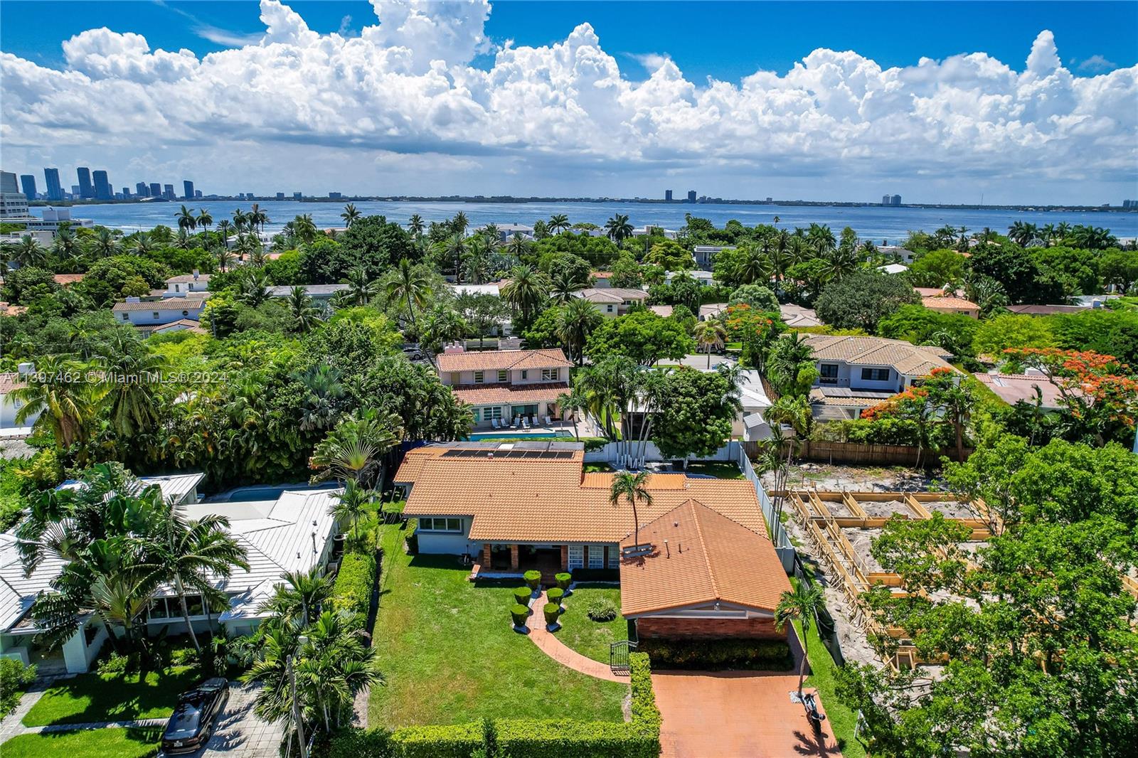 Great opportunity to own a 3-bedroom 3.5-bath home in the heart of Miami Beach located in the safe, quiet Nautilus neighborhood. This 11, 275 sq ft prime location lot could give you the chance to eventually build your dream home. Standout features include an open floor plan with laundry, quarters for storage, and a large front yard. The property is fully fenced in with a backyard space as well as a beautiful pool and outdoor dining area. Located near La Gorce Country Club and A-rated schools like North Beach Elementary. Located across the street are tennis courts and Polo park.