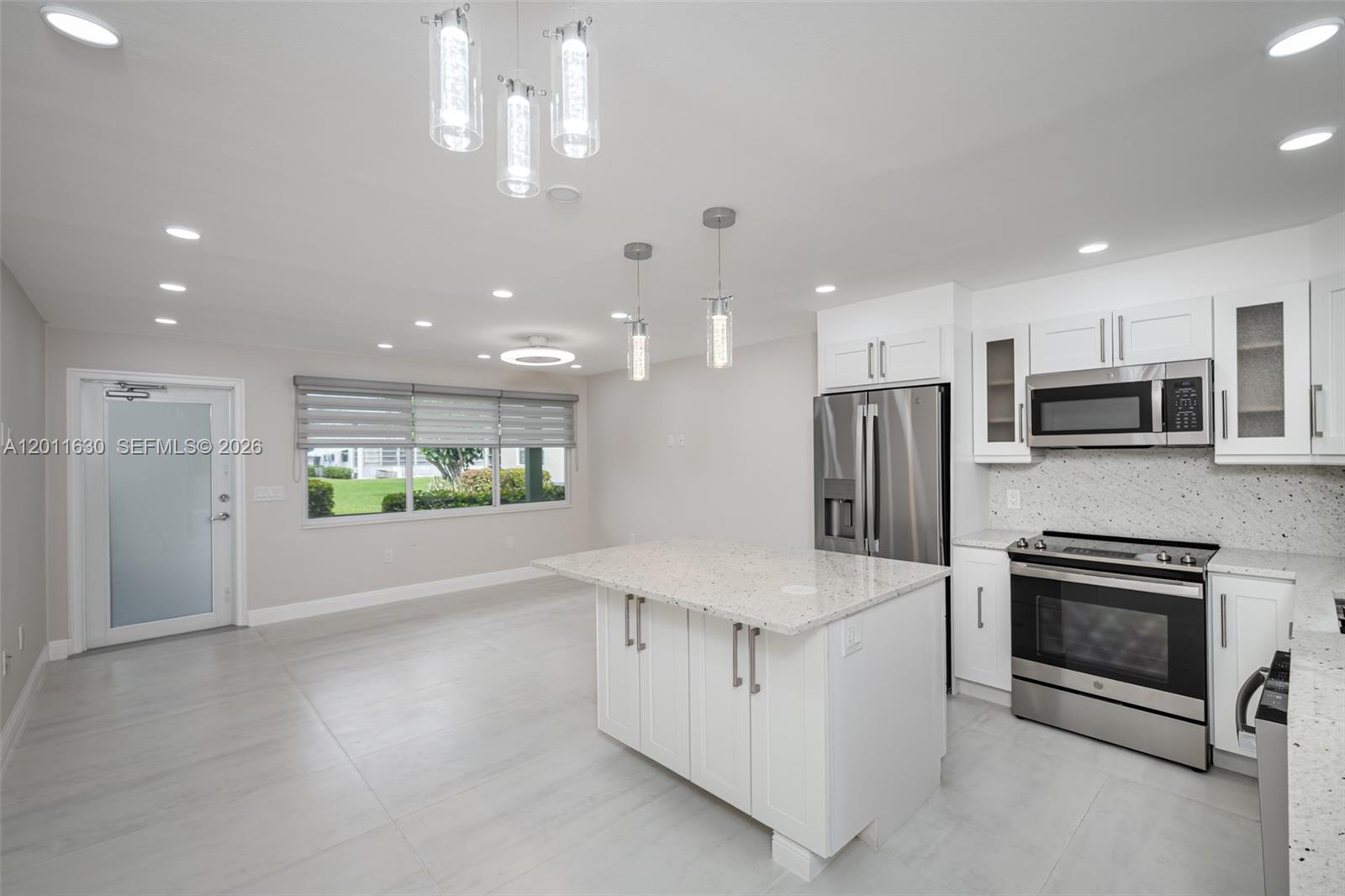 This community is perfect for active 55+ residents only! Thoughtfully remodeled, modern, light and bright firstfloor apartment! Beautiful, brand new kitchen withgranite counter, SS appliences, impact windows, and door, tilethroughtout, extended bedroom, central AC, tankless water heater, curbless shower, built in cabinets, zebrashades, remote fansrecessed lights and much more! Welcome to Century Village, Deerfield Beach's Active 55+adults gated community. Features: clubhouse, with indoor &outdoor pools, live shows, fitness center, tenniscourts, shuffleboard, volleyball, bocca ball, pickle ball. Convinient in-house bus transportation to local malls,shopping centers and medical facilities. Close to the Beach, restaurants, and shops and more. 
file:///P:/A-EVI%20UPMINSTER/PICTURES%20LUIS/1196037013.htm