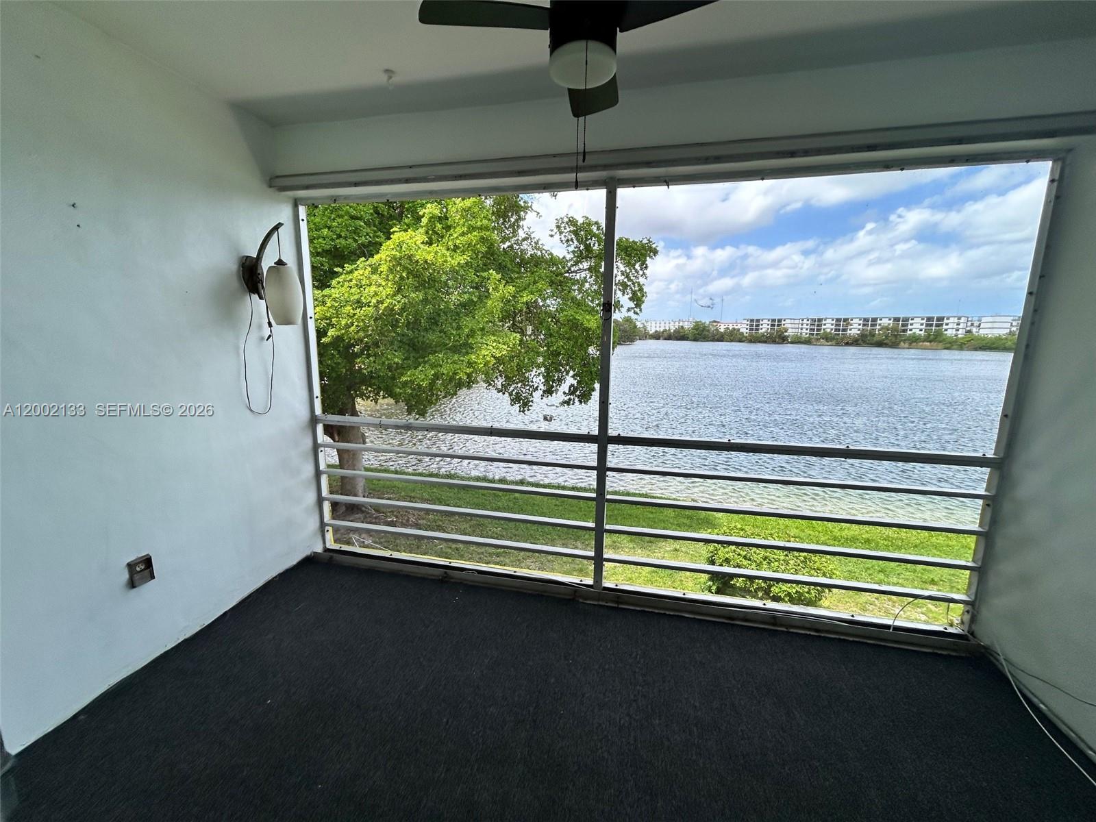 Star Lakes Condominium is a 55+ community that is centrally located between downtown Miami and Ft Lauderdale and minutes away from Miami International Airport and Ft Lauderdale International Airport. This 660 square foot suite has an amazing, tranquil water view that catches your eye the moment you enter the space. Relaxing on the screened balcony overlooking the lake with the cool South Florida breeze is a must experience. There are two entrances to your home, the main living area entrance and the kitchen entrance, which is useful when cooking or unpacking groceries. Tile flooring throughout and new carpet in the bedroom. And by the way, the bedroom easily accommodates a king size bed with space to spare. The clubhouse is preparing a new gym and the pool area has generous space for gatherings and special events with ample parking across the street. Come and see what separates this unit from everything else on the market and make it your home today. No Investors, can not rent for the first year.