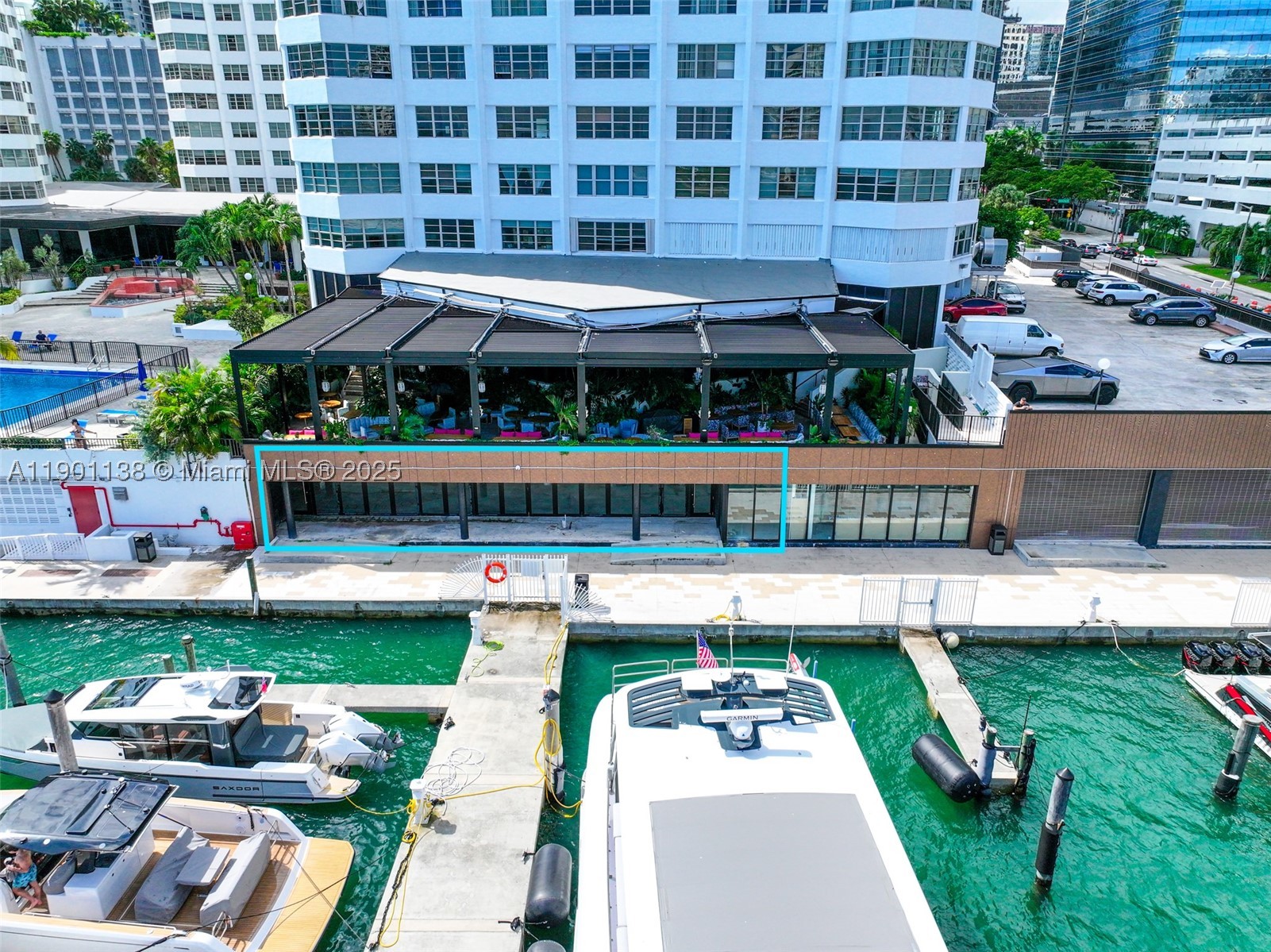 The Property: 5,411 SF commercial condo (Unit 4C042) with direct frontage along the historic Four Ambassadors waterfront concourse on the Brickell Bay Boardwalk — a rare bayfront location ideal for retail, restaurant, or office use in the heart of Brickell. Includes an approved liquor license reservation for full liquor service, a valuable entitlement enhancing restaurant or lounge potential. Grease trap ready to install; utilities stubbed for efficient build-out. Features ~45 feet of prime waterfront frontage with sweeping bay views, private on-site parking, and potential for dock access, outdoor dining, or open-air events — a unique waterfront opportunity in Brickell.