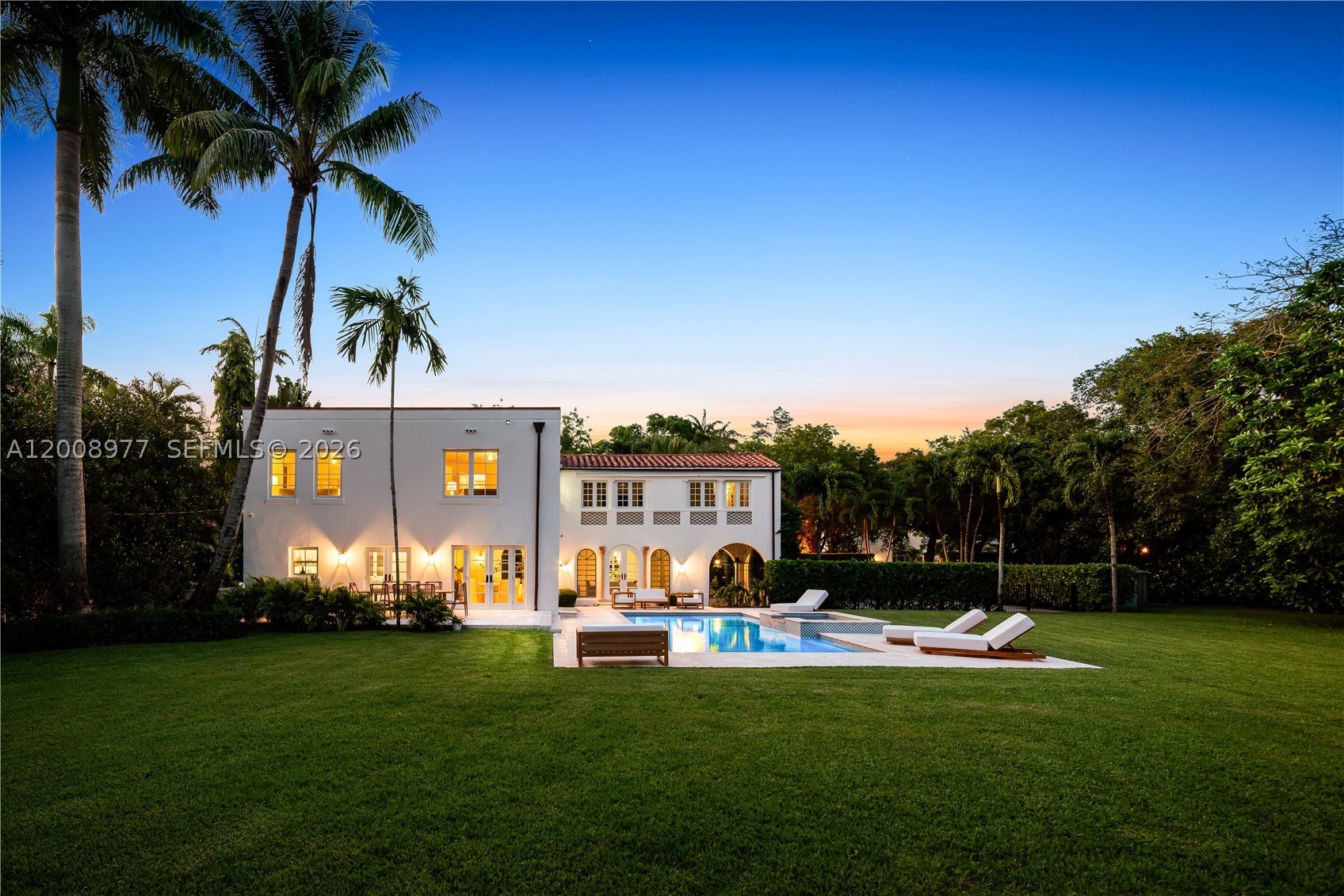 On a vast, park-like half-acre-plus property, this venerable, classic "Old Spanish" style villa—designed by Alexander Dentman and greatly expanded in 1929 by Phineas Paist—offers preserved original charm and character in perfect harmony with its recent professional updating. There is a main two-story residence and a lavish 2-bedroom, two-bath separate guest house. Both structures are fully renovated with impact windows, new bathrooms, chef's kitchen with 6 burner Viking gas range and brand-new Sub-zero refrigerator, new 37' long pool, new landscaping and more. Phineas Paist (1873–1937) was the supervising architect for the Coral Gables Corporation and is credited with shaping the aesthetic identity of Coral Gables, Florida. He was a master of the Mediterranean Revival style, often collaborating with artists like Denman Fink to create iconic public spaces and landmarks. His portfolio includes some of the most recognizable structures in South Florida, many of which are listed on the National Register of Historic Places including Villa Vizcaya, Coral Gables City Hall, Venetian Pool, The Colonnade Building, the Old United States Courthouse and Douglas Entrance. This walled and gated close to 5000 square foot home has 6 bedrooms and 4.5 baths and is located close to The Coral Gables Country Club, Granada Golf Course, the Venetian Pool and is just a 15-minute Uber ride to Miami International Airport.