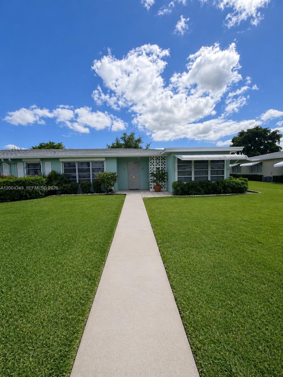 Welcome to this bright and beautifully updated 2-bedroom, 2-bath corner villa with a den in High Point of Delray. Offered fully furnished, this move-in-ready residence is ideal as either a primary home or a seasonal retreat. The spacious living area features durable vinyl flooring and updated trim throughout, creating a clean and modern feel. The renovated kitchen offers both style and functionality, perfect for everyday living and entertaining. Enjoy additional living space in the enclosed and raised Florida room, along with the versatility of a den, ideal for a home office, guest area, or cozy retreat.