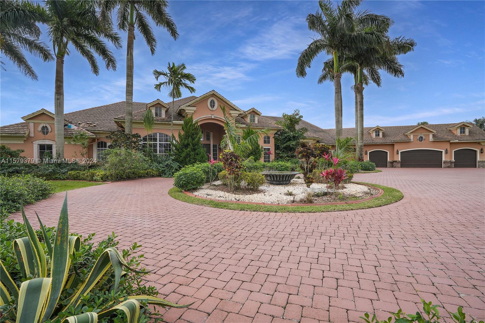 Exquisite French-inspired situated in the coveted sunshine ranches community of southwest ranches. Hidden away on a serene cul-de-sac with only three neighboring homes. This property spans nearly four acres of beautifully maintained gardens. The ranch style layout exudes sophistication wit features like marble flooring, a media room, dual master suites, and private bathrooms in each bedroom. The state of the art kitchen is outfitted with premium appliances making it perfect for culinary enthusiasts. the state also includes an expansive lanai, outdoor kitchen, and a luxurious pool and spa, ideal for entertaining or relaxation. Enhaced with hurricane-resistant and doors, plus automatic generator. This Home is both secure and distinctive.SELLER TO ACCEPT CRYPTO