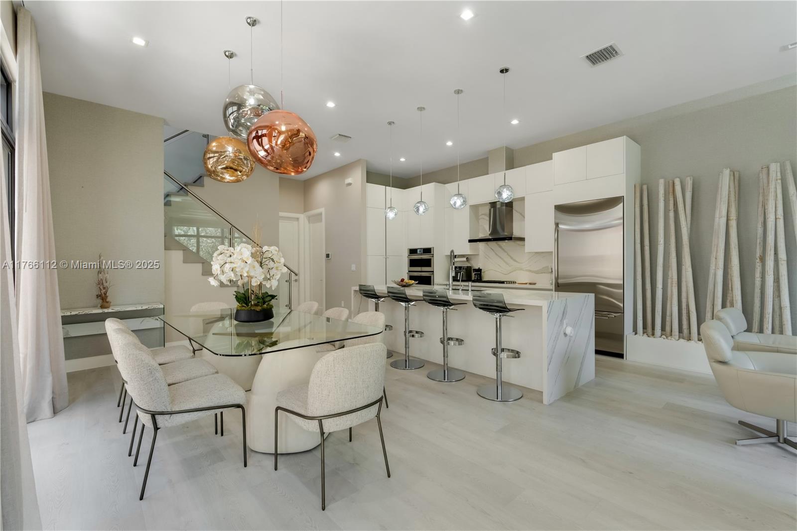 Experience luxury living in this stunning CADIZ model home, nestled in the prestigious Canarias at Downtown Doral. This elegant residence features 3 bedrooms, a loft space, 3.5 bathrooms, a spacious two-car garage, and an additional outdoor parking space. Designed with an open-concept layout, it boasts a sophisticated European-style kitchen and seamless indoor-outdoor flow. Residents enjoy access to world-class amenities, including a clubhouse, resort-style pool, state-of-the-art gym, kids’ play area, and an indoor basketball court. Perfectly located near top-rated schools, supermarkets, parks, restaurants, and with easy access to the Palmetto Expressway, this home offers the ideal blend of luxury, convenience, and vibrant family living.