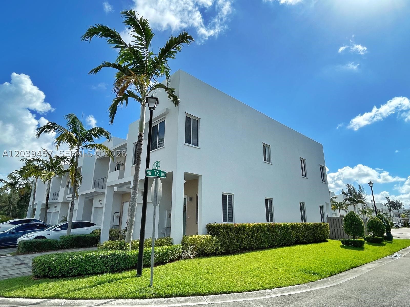 Exceptional corner-unit townhouse in the heart of Doral offering 4 bedrooms, 3.5 bathrooms, spacious living areas, abundant natural light, and a private fenced patio with spa/jacuzzi—perfect for relaxing or entertaining. The thoughtfully designed floor plan provides comfort, functionality, and flexibility for today's lifestyle. Residents enjoy access to world-class amenities including a resort-style clubhouse, swimming pool, fitness center, playgrounds, and more. Ideally located near top-rated schools, shopping, dining, parks, and major highways. Move-in ready and an outstanding opportunity to enjoy the best of Doral living.