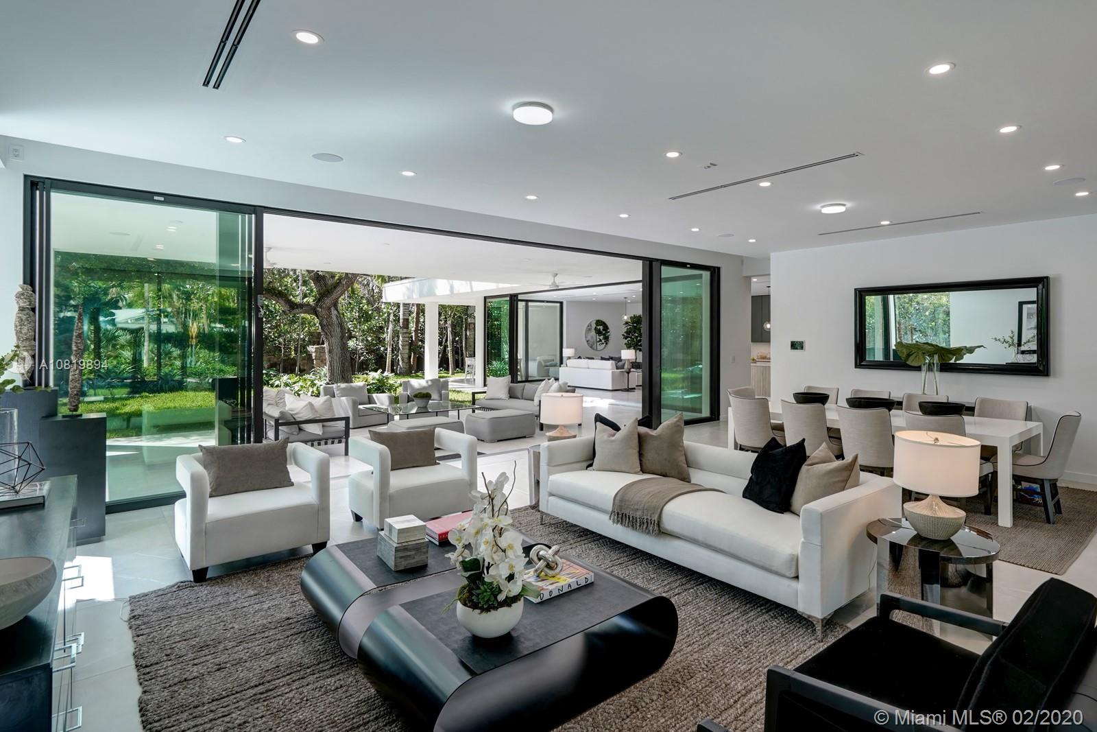 The design of this home embraces the garden setting its in. The minute you walk through the front door, it feels like you are in a beautiful garden setting. All glass exterior facing the garden and a seemliness flow from all areas inside to outside. Modern yet warm design and perfectly balanced use of space and land.  Situated in the desirable gated Four way estates community, in south grove off the bay. Walking distance to the center of the Grove where a total transformation is taking place making the Grove more desirable than ever. Here you can live the ultimate lifestyle in Miami, walk to the local cafe and enjoy peace and tranquility in a stunning setting at home.