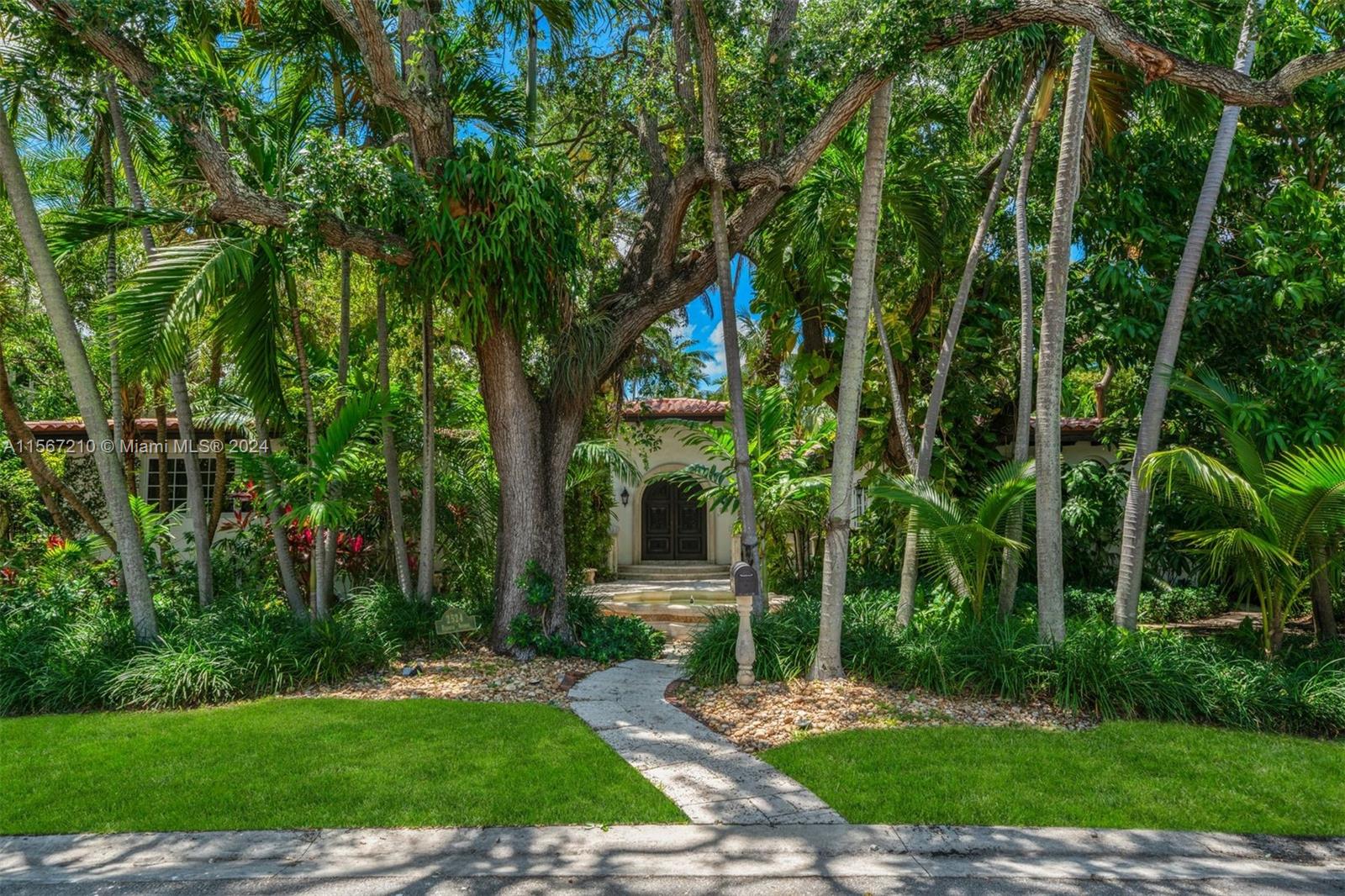 Step into an exclusive, guard-gated Sunset Island II retreat, where a tranquil fountain welcomes you to this stunningly renovated home. Upon entering, the expansive living and dining area seamlessly connect to the pool, which receives abundant sunlight, creating a serene atmosphere around the heated saltwater pool. The master bedroom offers a large separate shower and tub, while the junior master suite has ample space, wood flooring, and overlooks the lush outdoor oasis. This home also features a converted office and a spacious media room, offering versatility and functionality. Tropical fruit trees adorn the property, adding to its natural allure. Escape to resort-style living in this captivating haven, where every detail has been carefully considered for a life of luxury and comfort.
