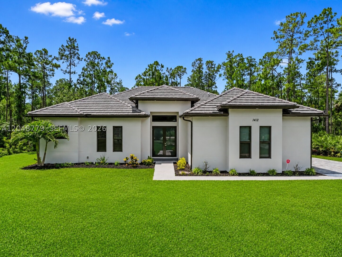 Discover comfortable living in this single-story residence located in Golden Gate Estates Unit 24, Naples, Florida. This thoughtfully designed home features three bedrooms and two and a half bathrooms across 1,987 square feet of living space, offering a functional layout with plenty of room for everyday living and entertaining. The two-car garage provides ample parking and additional storage, while the single-level design offers convenience and easy accessibility.

Please note: Some listing photos have been virtually staged to help illustrate the home's potential. Furniture, décor, and certain enhancements shown in the images are for visual reference only and may not represent the property's current condition or included features.

Whether you're searching for a primary residence or your next investment opportunity in Naples, this home offers a versatile layout and the chance to make it your own. Schedule your private showing today and experience its potential firsthand.