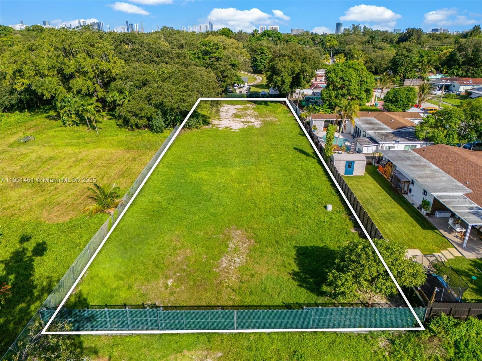 Rare development opportunity in unincorporated Miami-Dade! This 0.56-acre (±24,200 SF) parcel is ideally located near North Miami Beach and Aventura, surrounded by established residential homes. Zoned RU-1 (Single-Family Residential District), the property allows one single-family residence by right or potential subdivision into three conforming lots (subject to County approval). Builders may also explore added density incentives through Miami-Dade’s Workforce Housing Development Program (WHDP). The site’s rectangular shape, prime suburban location, and proximity to NE 6th Ave (SR-915) and I-95 make it a strong opportunity for custom home development or long-term investment.