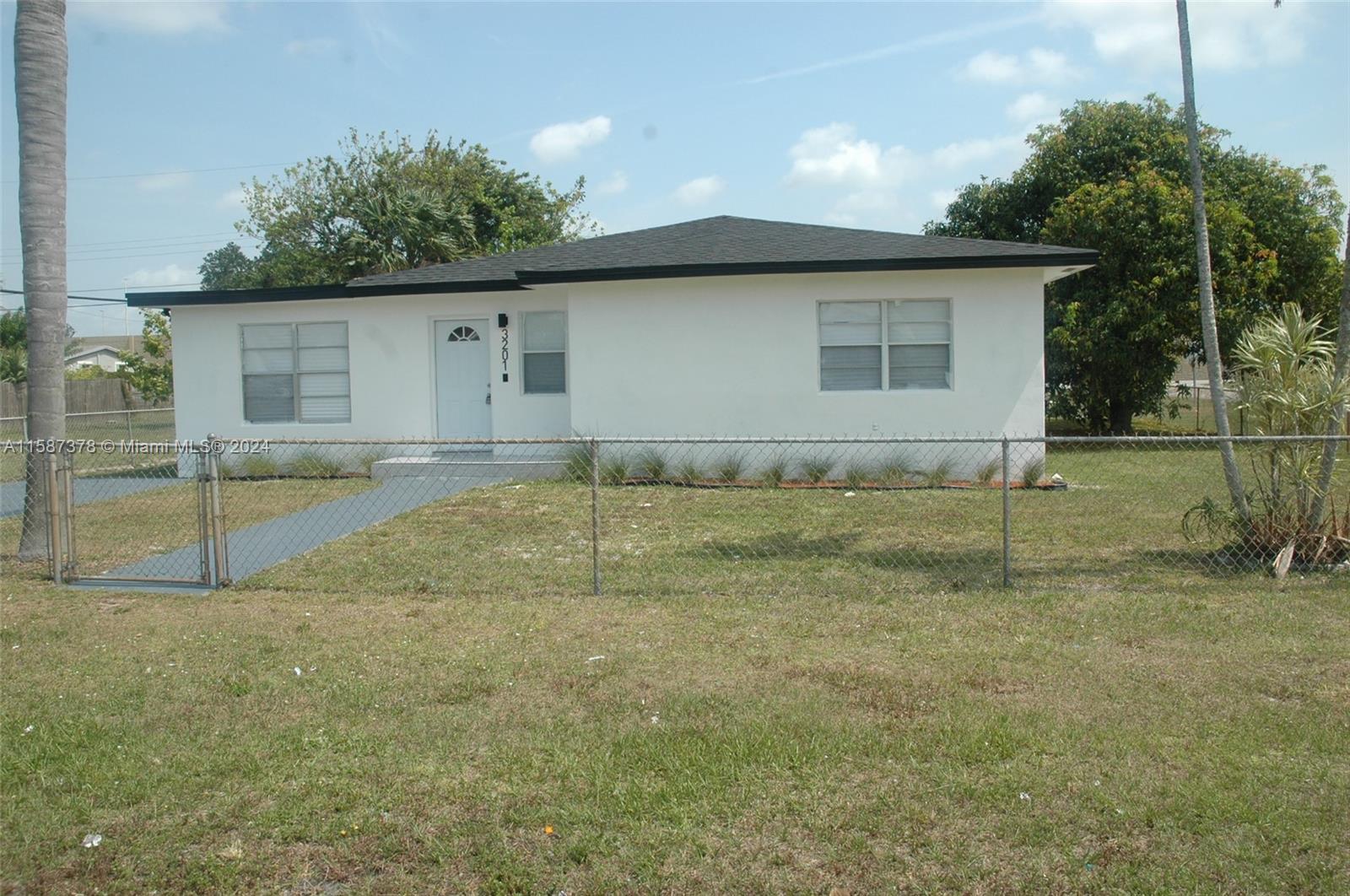 Location ! Location! Three bedroom one bath home over 1,000 sq ft in hot area. Homes with smaller square footage selling for over $500,000.00. New roof done with permits. Home is updated. New Kitchen cabinets, new quartz countertop, new backsplash,new tankless water heater,new air conditioning unit in and out, new led lighting thru out, new front and rear doors, new beautiful floors and modern contempory design.New bathroom with new sinks and toilets and walk in shower. Appliances will be  installed prior to closing or a credit can be offered.