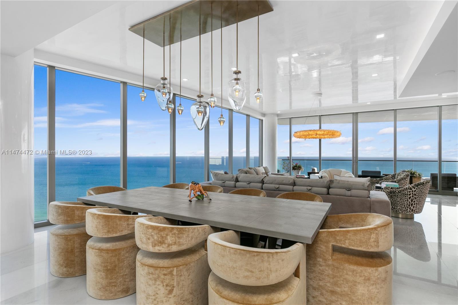 Ultra-luxury at its finest. The only "Capri" model in the building, this expansive residence features a 5200sf interior plus 1000sf of outdoor living complete with summer kitchen and sauna. Sweeping views of the ocean, bay and glittering skyline, this home has been outfitted with elegant finishes that include genuine marble floors, white onyx primary bathrooms with dual showers and tub overlooking the ocean, chef's kitchen and smart home automation. 4405 is offered turnkey-furnished with tasteful and warm appointments by Holly Hunt, Henge, and Fendi. Unrivaled building amenities with 5 restaurants on property, 3 pools, Rolls Royce house car, daily breakfast, waterslide, Surfrider, cinema, bowling, skating, F1, golf simulator, mini soccer field, half-basketball court and 2 dog parks.