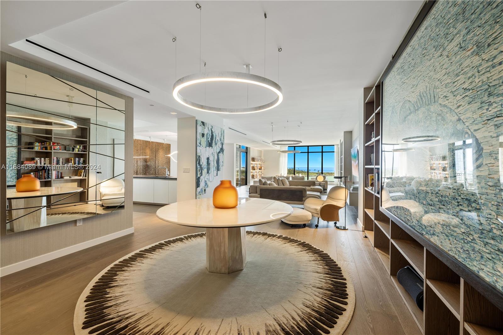 Experience the essence of Palazzo Del Sol living on Fisher Island in this exceptional 3,793 SF residence, fully furnished, finished, and meticulously prepared for immediate enjoyment. Designed by HENGE ITALIA, it features 3 beds + 3.5 baths with unparalleled Italian craftsmanship. The flow-through layout showcases spectacular ocean views along with vistas of the golf course and Miami skyline. Every element has been carefully curated, from the Boffi kitchen with Gaggenau and Sub-Zero appliances to Lualdi doors and Listone Giordano wide-plank oak floors. Families will appreciate the private school. Fisher Island offers a lifestyle defined by elegance, privacy, and convenience. A rare opportunity to own a fully completed masterpiece in the USA’s most prestigious address.