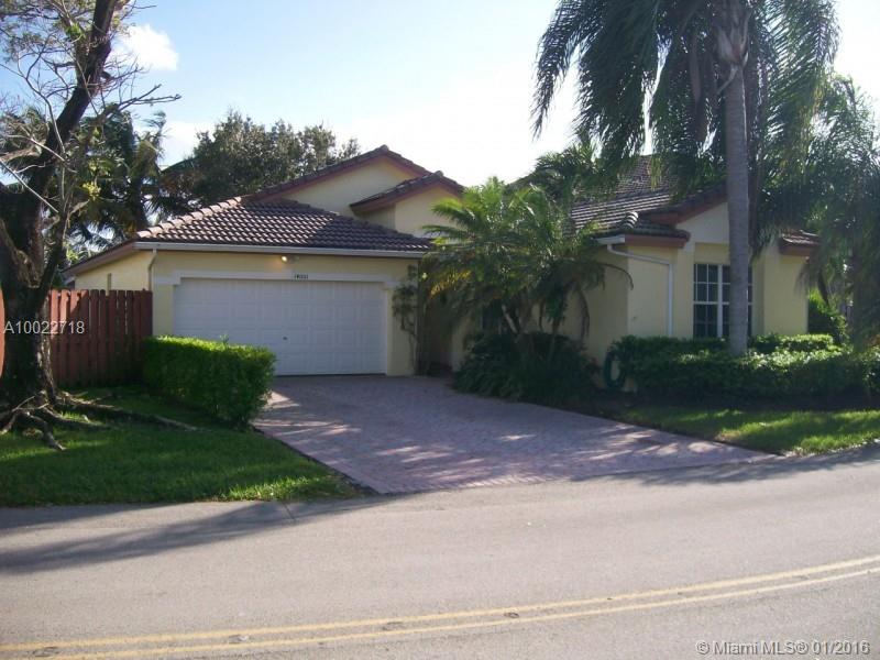 Nestled in a South Miami gated community w/pool, clubhse tennis courts, this lovely 4/2 lakeside home boasts a private dock. Enjoy formal LR  DR, eat-in KIT, FAM Rm  2c garage. Covered patio spans entire back of home. The look feel of southern
 living are offered by your coconut  fruit trees swaying in the breeze. Just a mile to shopping, dining zoo. Near major shopping malls beaches. Easy access to FL Turnpike. Enjoy boating  3 major marinas  the everglades w/in 10 miles!