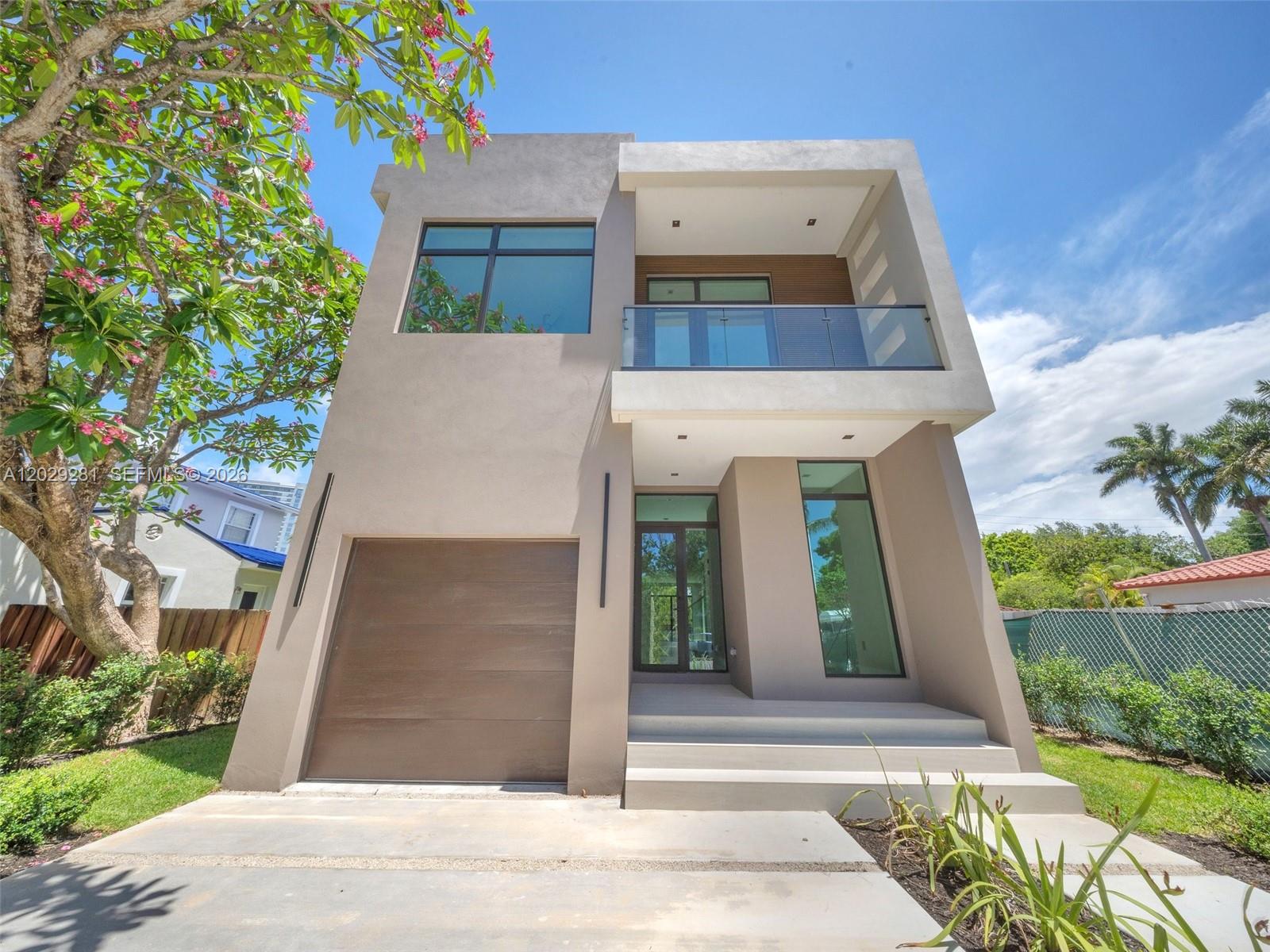Experience the best of modern luxury living in this brand-new construction pool home located in the highly desirable Hollywood Lakes area! This stunning 2-story residence offers 4 bedrooms plus a den, 4.5 bathrooms, and a 1-car garage, thoughtfully designed with today’s lifestyle in mind.

Step inside to discover high soaring ceilings, an abundance of impact glass windows that fill the home with natural light, and a seamless open-concept floor plan perfect for both everyday living and entertaining. The chef-inspired kitchen is the centerpiece of the home, featuring a beautiful oversized island, custom cabinetry, and premium appliances.

Designed for both comfort and peace of mind, the home offers great elevation to meet FEMA requirements, helping provide more favorable insurance opportunities.

Enjoy true South Florida resort-style outdoor living with a sparkling pool, covered porch, and fully fenced backyard, creating the perfect private retreat for relaxing or entertaining year-round.

Ideally situated near places of worship, Downtown Hollywood, and just minutes from the beach, this is a rare opportunity to experience the lifestyle and convenience of a new construction home in Hollywood Lakes.