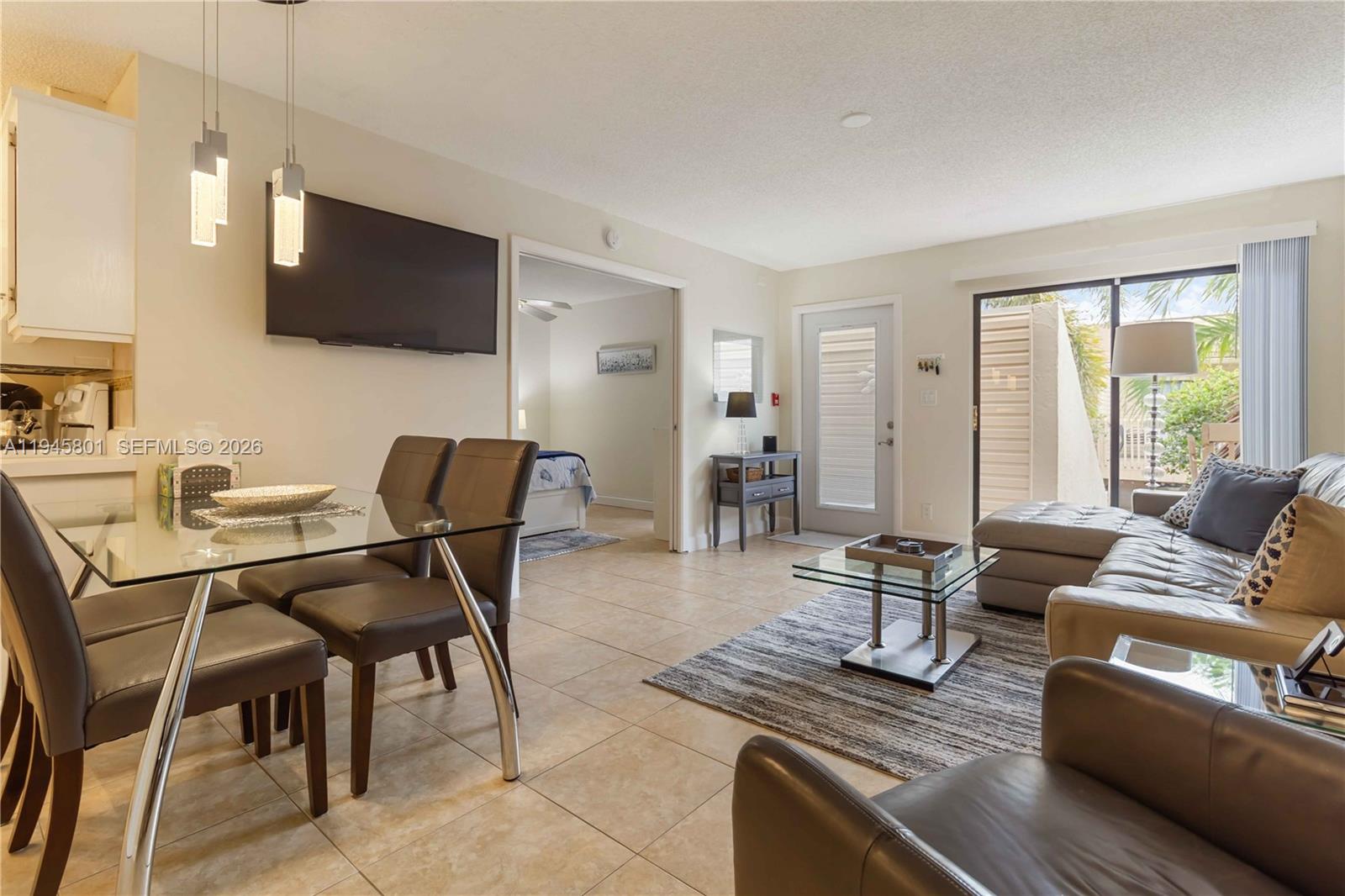 Well maintained 2 bedroom, 2 bathroom condominium located in the Lake Place community in West Palm Beach. This second floor interior hall unit features a functional split bedroom layout, high ceilings, and comfortable living space with natural light throughout. Includes a stackable washer and dryer, a practical open living and dining area, and ample storage.

Enjoy both a private patio and balcony that extend the living space and provide a quiet outdoor setting. The community offers amenities including a swimming pool, tennis courts, and clubhouse, along with assigned parking and professionally managed common areas.

Conveniently located near downtown West Palm Beach, major highways, shopping, dining, and Palm Beach International Airport. Suitable for a primary residence or seasonal use.