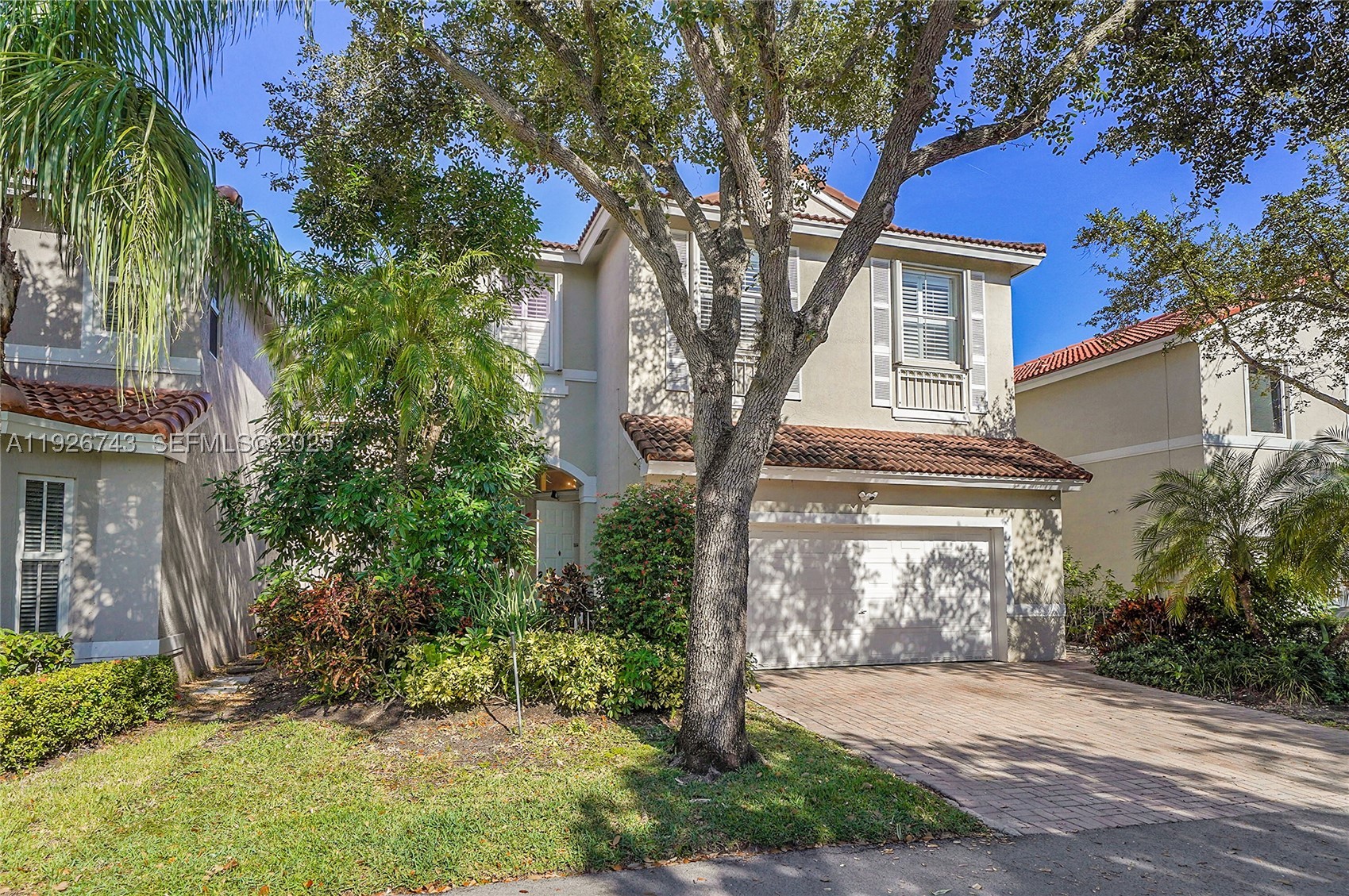 Live the West Lake Village dream in this stunning 5-bedroom, 2.5-bath home, currently configured as 4 bedrooms plus a luxurious master suite. Bright, open, and airy with wood floors throughout and marble baths, this home blends elegance with everyday comfort. Entertain effortlessly in the updated kitchen featuring a 15’ eat-in island (seating for 4), new Samsung Family Hub fridge, stove, and in-island washer/dryer. Smart home conveniences include Google Home cameras, Nest thermostat, ceiling fans throughout, new lighting, and a full alarm system.

The air-conditioned 2-car garage is currently configured as a professional home gym (video available) with elevated storage (200+ sf/700 cu ft) and laundry area; **gym equipment is negotiable and can remain or be removed..**

Main bedroom retreat boasts his-and-hers closets, glass shower, and tub. Outdoors, a wired gazebo with Bluetooth speakers, fans, and lighting makes entertaining a breeze. Accordion shutters add security and style.

West Lake Village amenities elevate everyday living: 24-hour manned gates, clubhouse with gym, pool, hot tub, kids’ area, and lush, walkable landscaping. Just minutes from the beach and downtown, enjoy peaceful strolls around Hollywood Lakes or soak in the vibrant community. This home offers comfort, modern updates, and lifestyle—move in and start living the dream.

Seller is actively preparing for the move, offering buyers a smooth transition into this exceptional West Lake Village home.