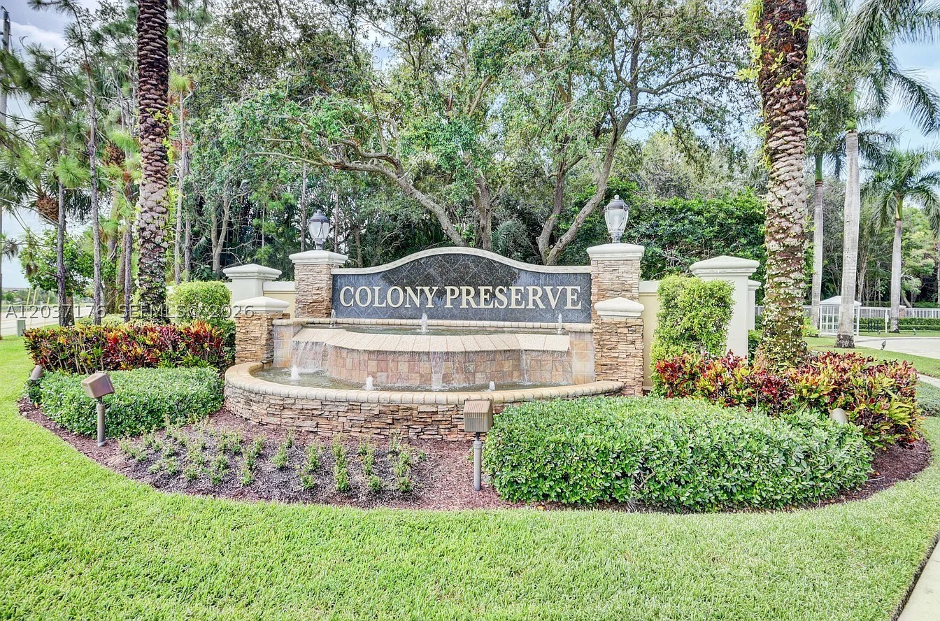 Live the highly desired Colony Preserve lifestyle in this beautifully one-story spacious home. Featuring 3 bedrooms plus a den—which can easily be transformed into a 4th bedroom—and 2.5 baths, this residence offers a perfect blend of comfort and style. Step inside to find sleek ceramic tile flooring throughout, leading to an open-concept kitchen equipped with a large center island, granite countertops. The expansive living space flows seamlessly to the outdoors, where you can entertain, barbecue, and enjoy serene, peaceful lake view. Practical features include a pavered driveway and full storm shutters on all windows. Colony Preserve offers for a low HOA with a secure, gated resort community featuring 24-hour guarded gatehouse and an on-site management office at the entrance. environment rich with premium amenities, including a resort-style clubhouse pool, jacuzzi, fitness center, spa, and a vibrant calendar of social activities!
