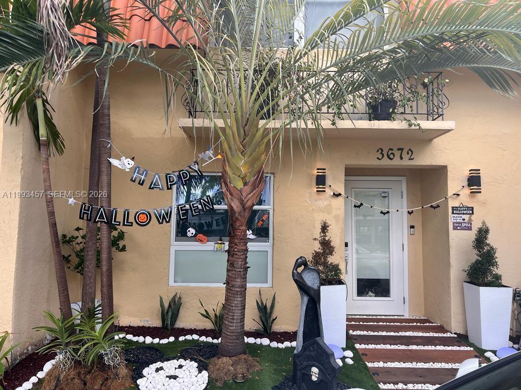 Exceptional modern luxury residence located in the highly sought-after North Miami Beach area. This meticulously remodeled home boasts an expansive open concept floor plan featuring large format porcelain tile flooring throughout, recessed LED lighting, and clean, contemporary finishes that create a bright and inviting atmosphere. The inspired kitchen is a standout, equipped with custom cabinetry, top of-the line built-in appliances, and a generously sized island with cooktop and seating ideal for both everyday living and entertaining guests. The seamless flow between the kitchen, dining, and living areas enhances functionality and style. A unique and highly desirable feature of this property is its private dock with direct ocean access, providing an exceptional opportunity for boating enthusiasts and those seeking waterfront lifestyle amenities right at their doorstep.  Additionally, a new roof was professionally installed, ensuring structural security and longevity. Monthly maintenance cover comprehensive building upkeep, common area maintenance, and community amenities, delivering excellent value for a residence of this caliber. Exclusive waterfront access making it a truly remarkable opportunity for discerning buyers in a prime North Miami Beach location