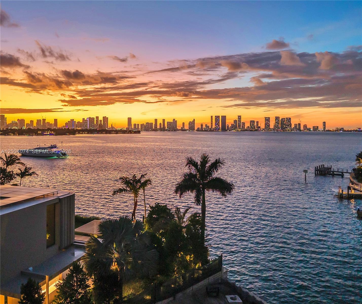 Extraordinary “Villa Tramonto” on gated Sunset Island 4 with sublime sunset views and coveted west exposure. Luxurious waterfront property being completed now so you can move into your dream home this summer! Arclinea designed chef kitchen, with Italkraft cabinets, Wolf, Subzero and Gaggenau appliances, full panel stair by Laura Meroni, and Radiance Lighting. Master suite with approx 2,000 sqft with separate sitting room and two primary bathroom and two primary closets. Creston smart home with voice command by Josh-ai. West-facing lot boasts 152 feet of prime waterfrontage, 6000 sq foot understory housing rare 10+ cars in climate-controlled gallery, gym, storage. Livable square footage is 16,000 sq feet. Walk to vibrant Sunset Harbor restaurants, retail, and purchase includes one year private membership Sunset Padel. Expansive terraces, resort-style double deck infinity pool with elegant water wall, steam room and sauna. Roof top entertainment deck for champagne sipping sunset soiree's, and private jacuzzi with 360 degree with of Miami Beach. Stunning custom furniture and furnishings being installed by Artefacto. Completion summer 2026 turnkey and ready to you to move in. Call today to take a tour of your new dream home.
