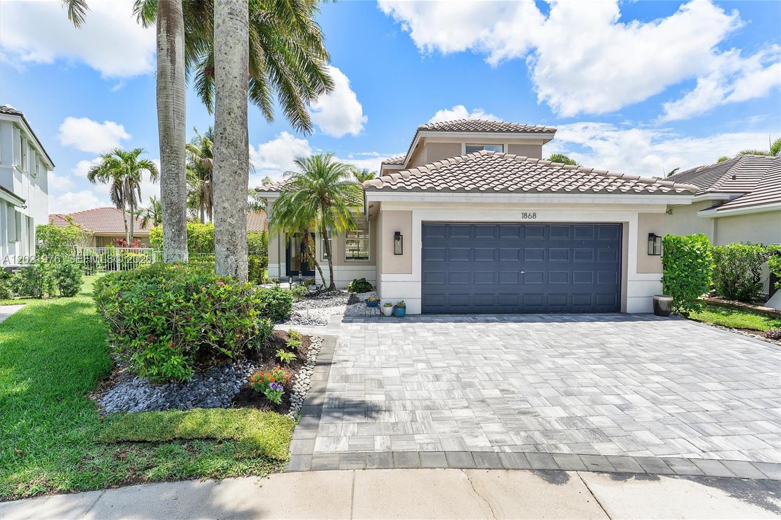 Welcome to this beautifully updated single-family residence nestled on a quiet cul-de-sac with no through traffic. The peaceful street provides a sense of openness and outdoor freedom right outside your front door. Inside, a thoughtfully designed layout offers rare flexibility with 2 primary-style suites—one on each floor—complete with private bathrooms and extensive walk-in closets. This versatile design effortlessly adapts to your lifestyle, perfect for a home office, recreation zone, or comfortable guest quarters. The property features premium modern upgrades throughout. The entry driveway has been expanded to accommodate 3 vehicles, fully replaced with elegant pavers that flow past the front entrance. Inside, the stairwell and upper level are finished with high-quality Swiss Krono laminate flooring engineered to handle daily wear with excellent water resistance. Two bathrooms have been fully renovated. The lower-level bath features a new bathtub, premium Delta plumbing fixtures, solid wood vanity with quartz countertops, recessed lighting, refined window casing, and an LED mirror with matching sconces. The upper bath is equally striking with a new vanity, modern tile work, and upgraded hardware. For optimal comfort, a separate cooling unit dedicated to the upper level ensures a perfectly balanced temperature during warmer months, nicely complementing the functional kitchen and convenient laundry setup. Mortgage savings may be available for buyers of this listing.