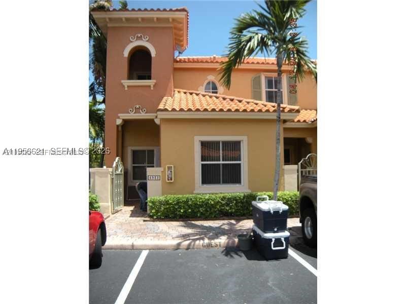 AMAZING CHARMING THREE BEDROOMS & THREE FULL BATHROOMS TOWNHOME. LOCATED IN VILLAS AT HARBOR ISLES A GATED COMMUNITY. CLOSE TO SHOPPING, DANIA BEACH, DANIA POINT, FORT LAUDERDALE AIRPORT. WALKIG DISTANCE TO PUBLIX. ONE OF THE BEDROOMS WITH A FULL BATHROOM IS ON THE FIRST FLOOR. ROOF INCLUDED IN HOA MAINTENANCE. SPACIOUS KITCHEN WITH NEW SS APPLIANCES. MASTER BEDROOM UPSTAIRS. THIS TOWNHOUSE IS A REAL BEAUTY!!!