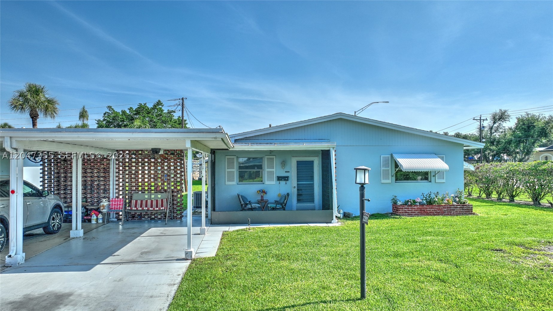 Every great home has a story, and this one begins with simplicity, comfort, and convenience. Nestled on a desirable corner end unit in a beautifully maintained 55+ courtyard community, this 2-bedroom, 2-bath residence is designed for easy living. Step inside to discover tile flooring throughout, an abundance of storage with multiple closets, and an oversized Florida room under air—perfect for morning coffee, hobbies, or entertaining year-round. The spacious laundry room includes a utility sink, while the separate storage room keeps everything organized. Connected to city water and sewer for added convenience, this home is just a short stroll from a nearby shopping center, making daily errands effortless. Whether you're looking to downsize without sacrificing space or enjoy a low-maintenance lifestyle, this inviting home is ready to welcome its next chapter—you.