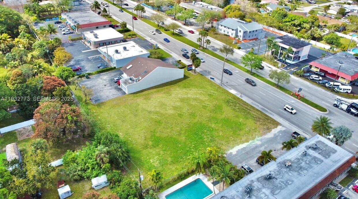 Prime commercial and residential development site on W Atlantic Blvd in Margate featuring 26,700 SF (0.61 acres) with strong visibility and convenient access to SR-7 / US-441. The site allows for a 9,000–12,000 SF building with potential for up to 4 stories, offering flexibility for a wide range of development concepts. The land is surrounded by dense residential neighborhoods and established commercial uses, creating strong demand for both residential and commercial projects. The site is strategically positioned within a well-established area with consistent daily traffic and a built-in customer base, where limited available land creates strong demand for new, modern development.