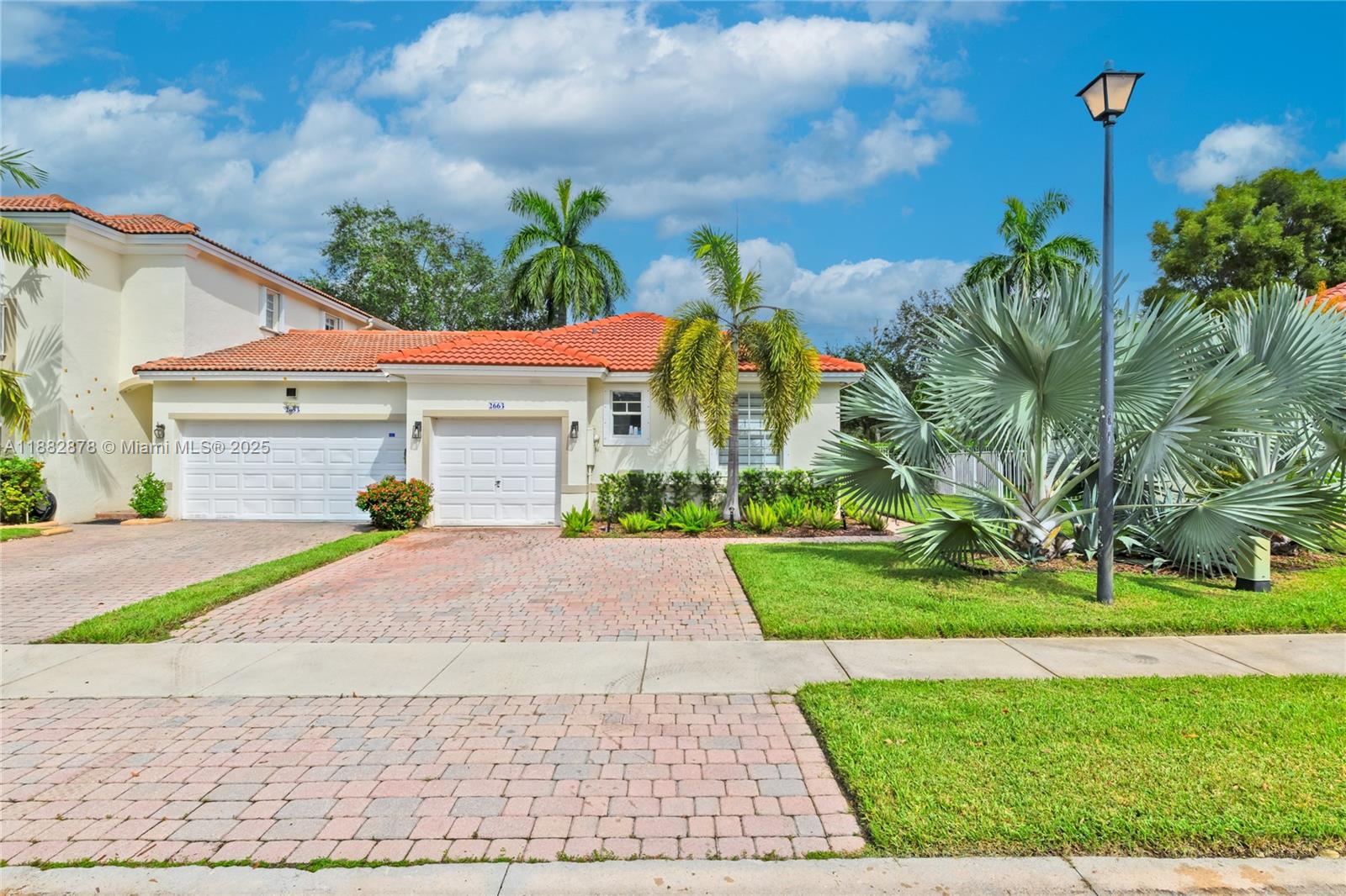 Pristine and stylish. Completely remodeled 2-bed, 2-bath single story corner unit townhouse with private garage. Ultra modern finishes and open floor plan. Located in quiet community with pool and gym. Turnkey and move-in ready!